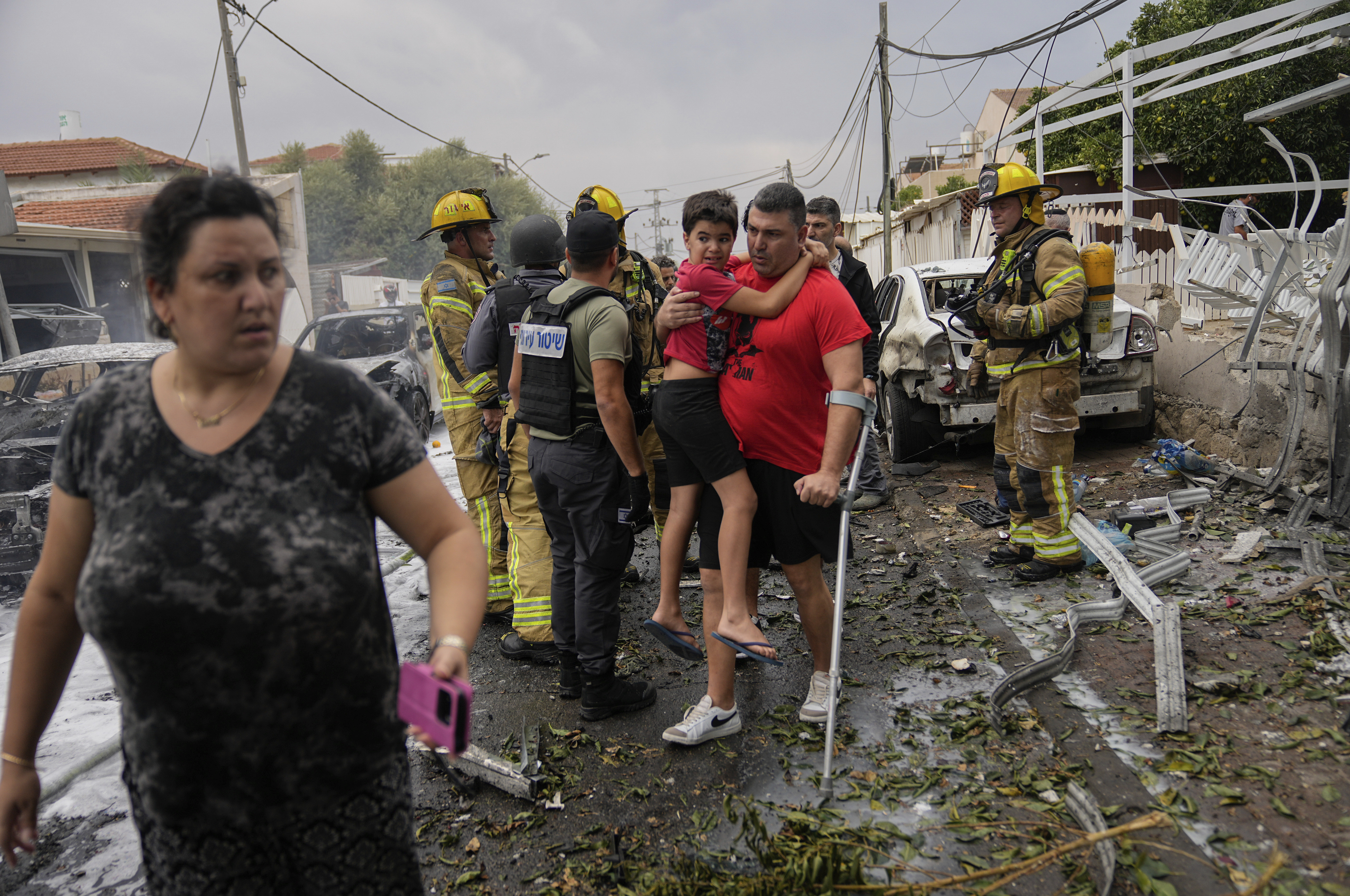 Mon., Oct. 9: Israelis evacuate a site struck by a rocket fired from the Gaza Strip, in Ashkelon, southern Israel.