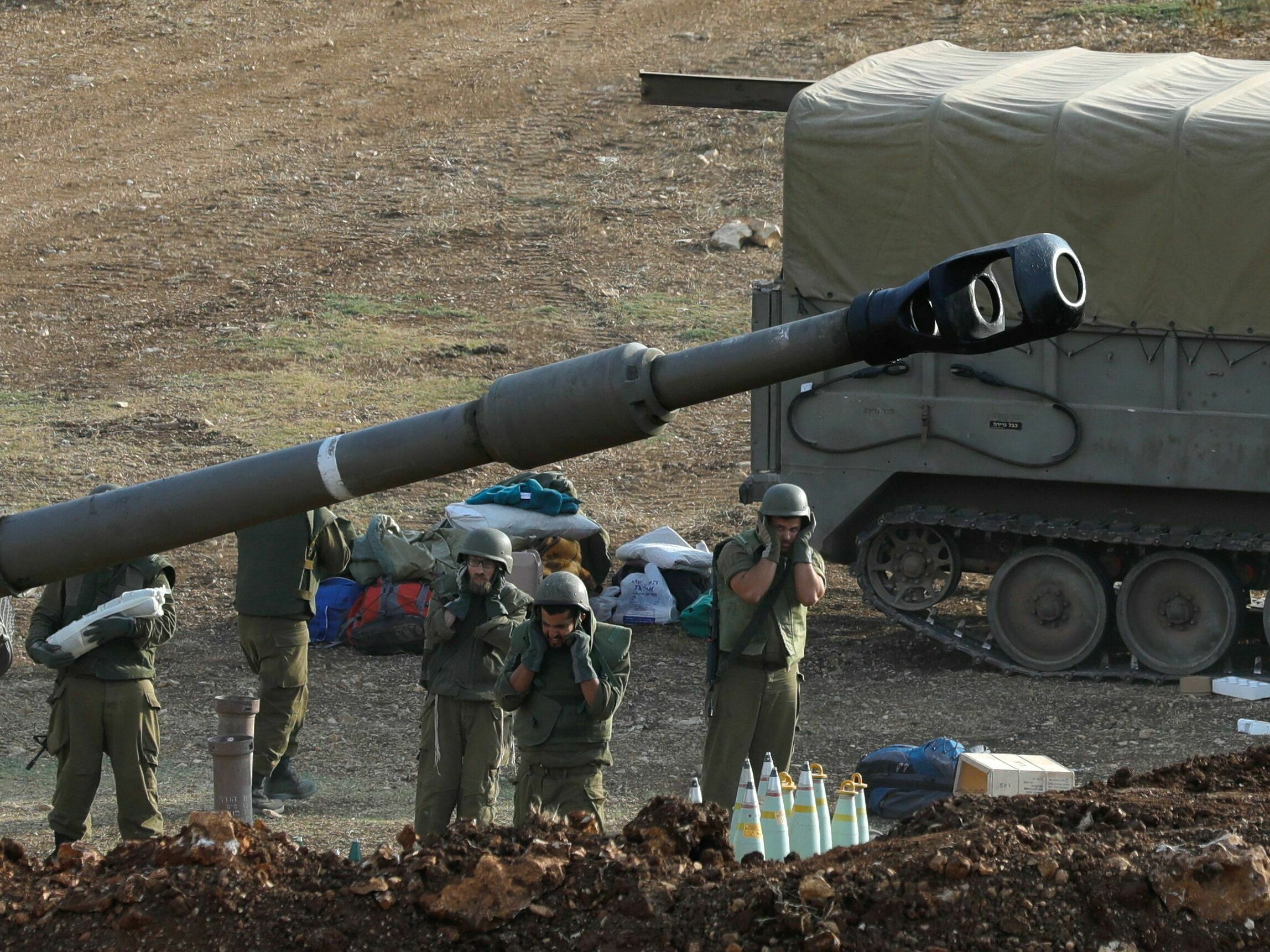 Israeli forces launch artillery fire toward southern Lebanon from the border zone in northern Israel on Monday, while Hezbollah denied involvement in clashes or &quot;any infiltration attempt&quot; into Israel. (AFP via Getty Images)