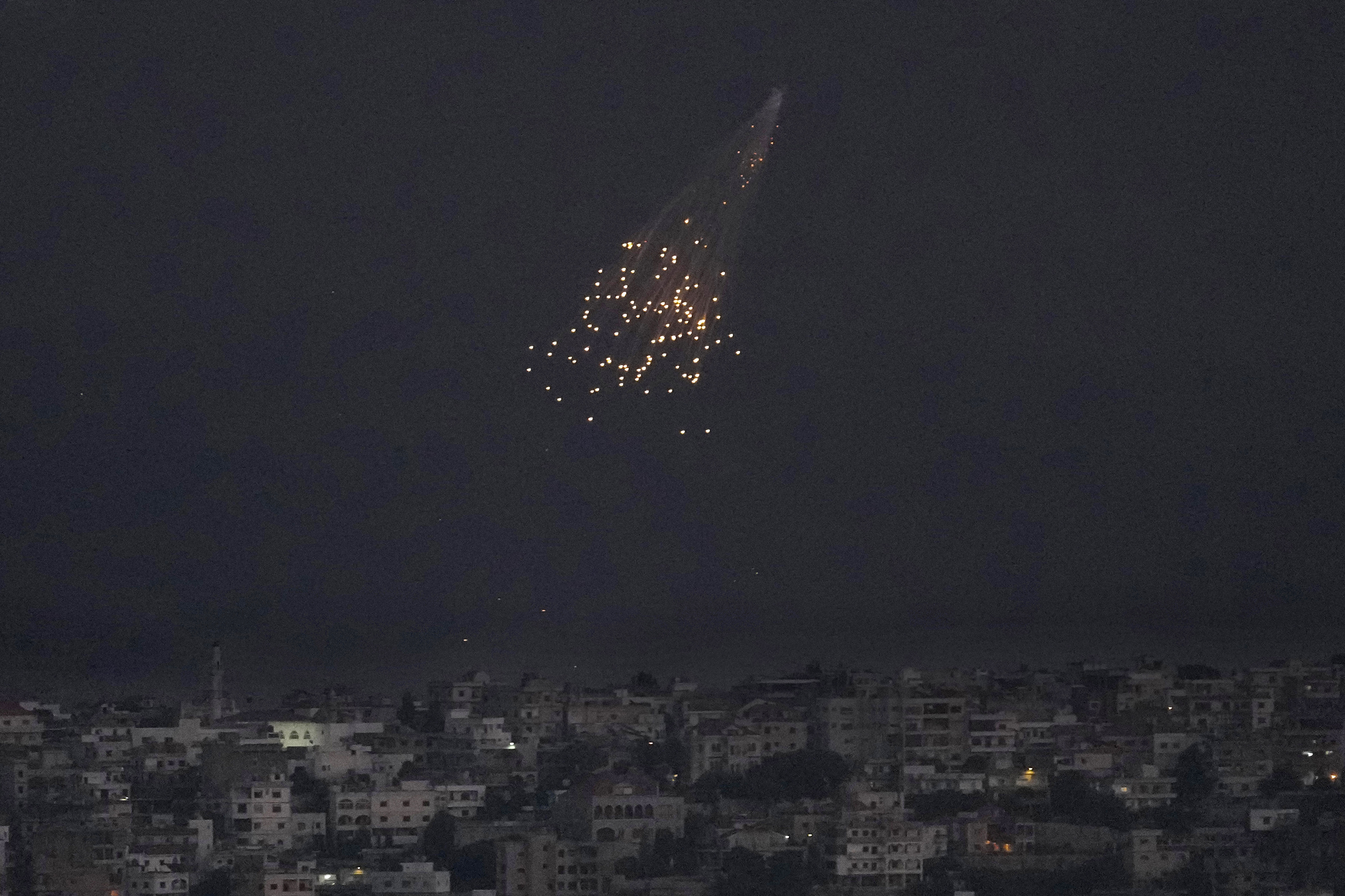 Tues., Oct. 10: A shell from Israeli artillery explodes over Bastra Farms in the disputed Shebaa Farms territory, south Lebanon.