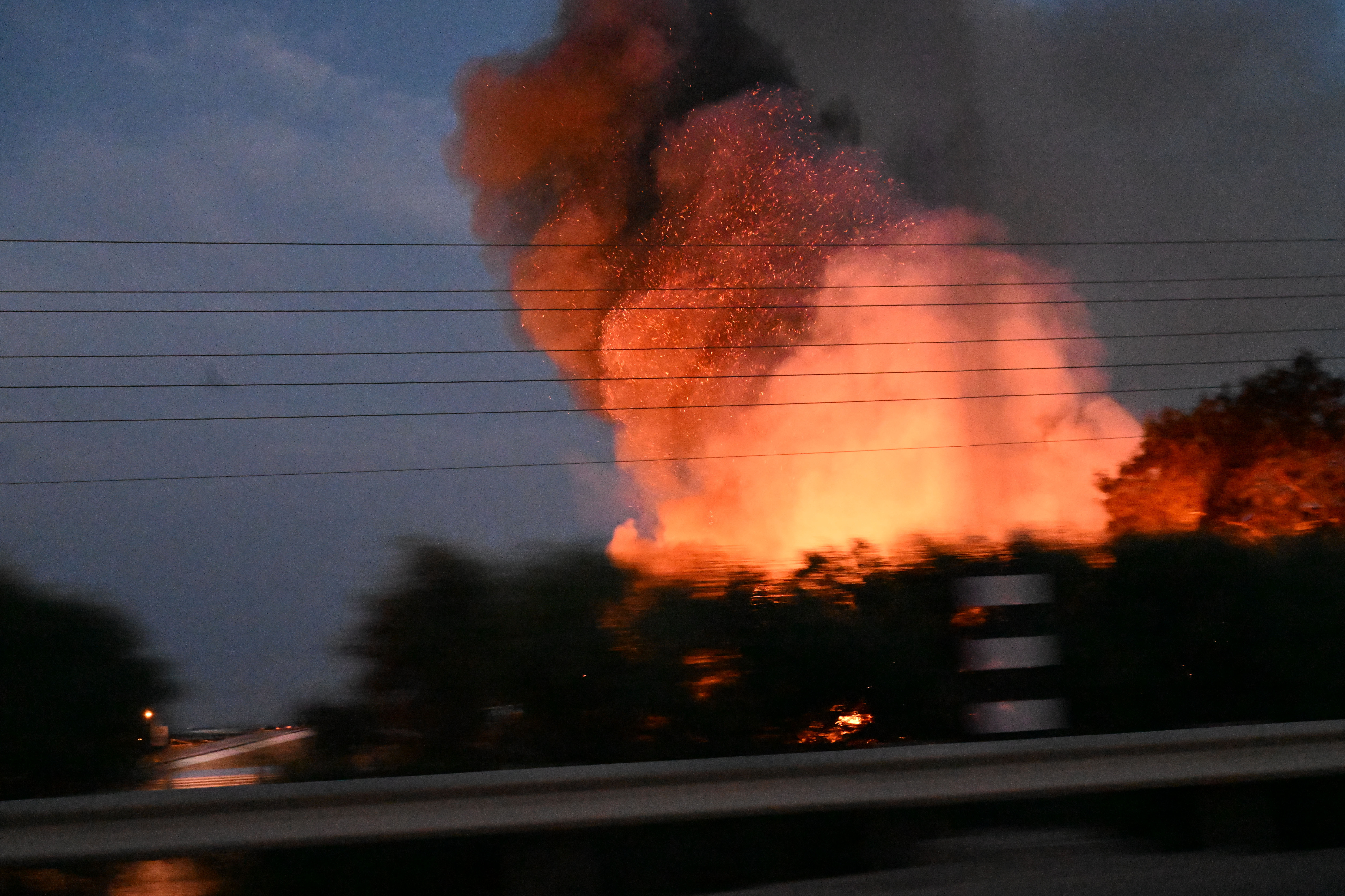 At a rest stop near Hamas attack sites, Israelis rush to help families and soldiers 11 Fire burns after an apparent rocket attack on an open field, following a convoy that was entering its last run to rescue a family from Sderot.