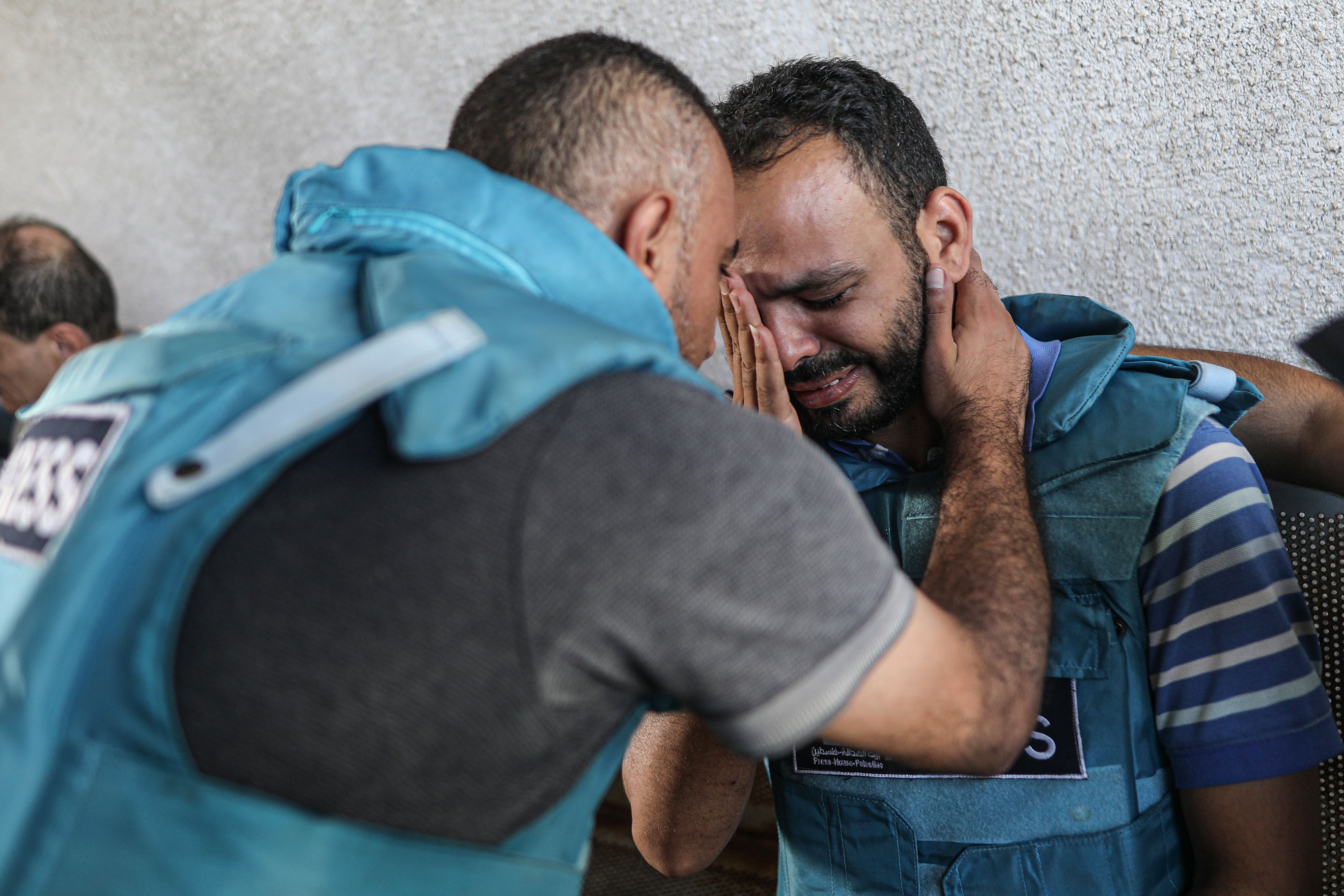 Tues., Oct. 10: Relatives and colleagues of Palestinian journalists Saeed Al-Taweel and Mohammad Sobh, who were killed in Israeli airstrikes, mourn in Gaza Strip.The journalists were killed while filming the targeting of a residential building by Israeli warplanes in Rimal district in western Gaza.