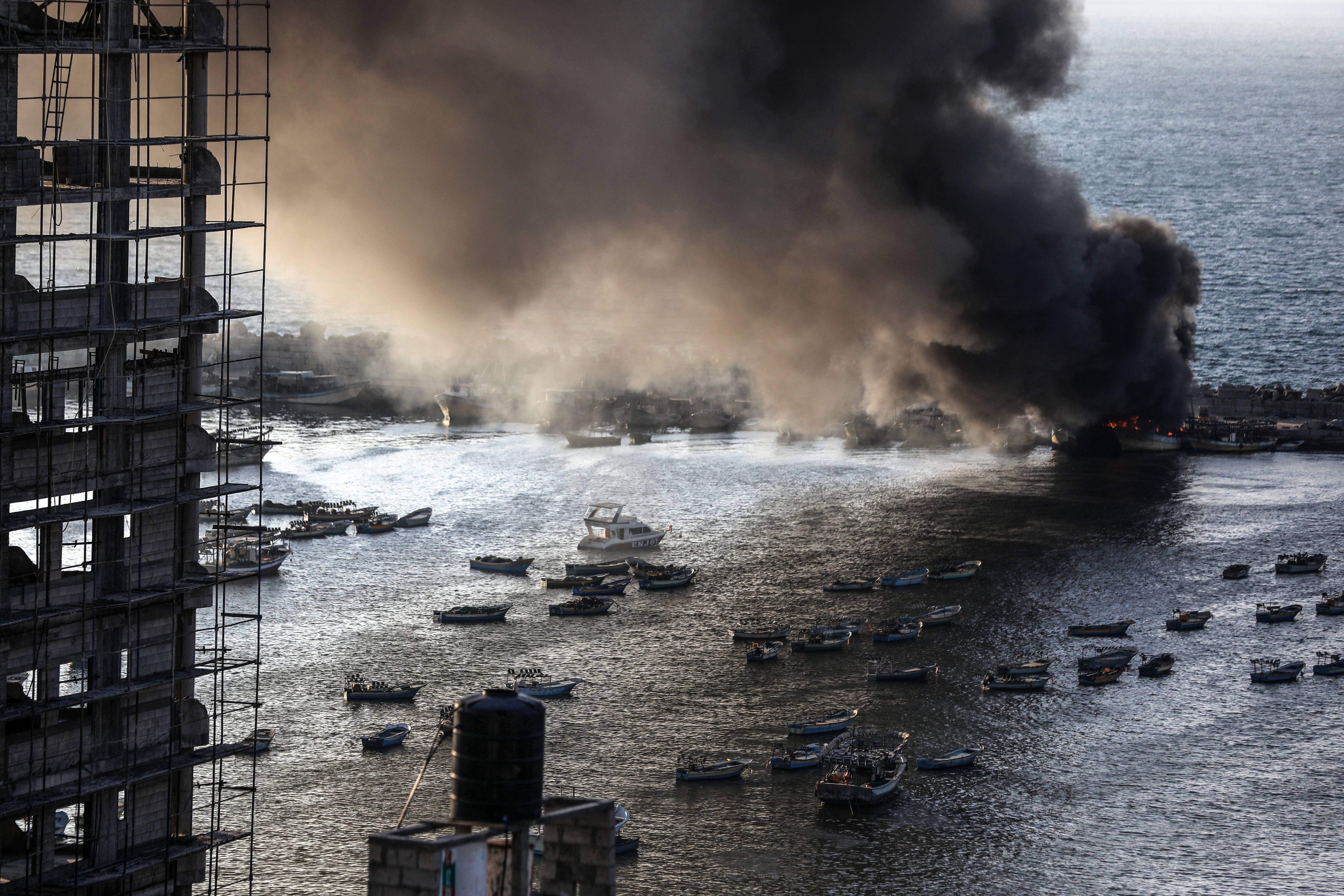 Tues., Oct. 10: Smoke billows after a strike by Israel on the port of Gaza City.