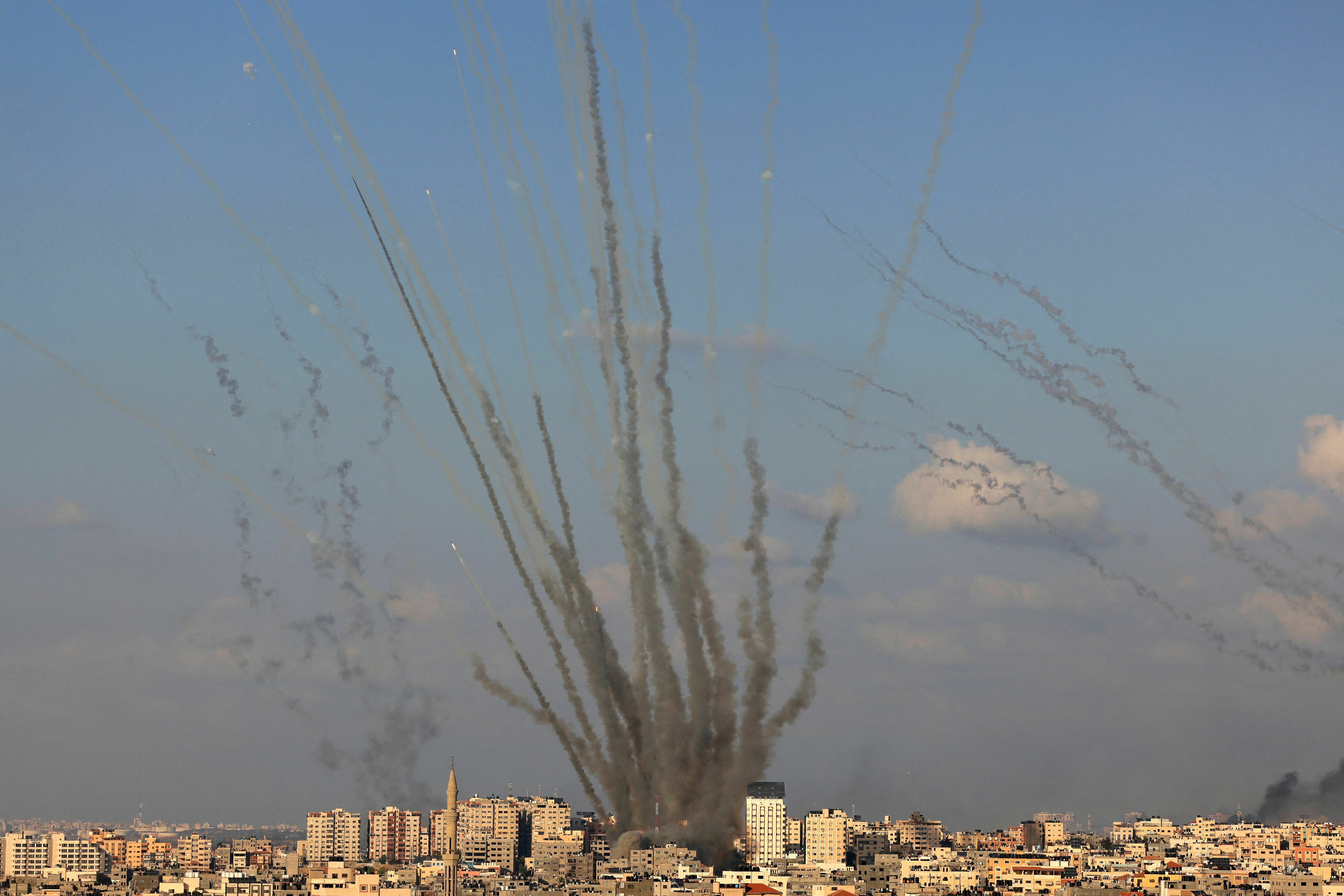 Rockets are fired by Palestinian militants from Gaza toward Israel on Tuesday. (Mahmud Hams/AFP via Getty Images)