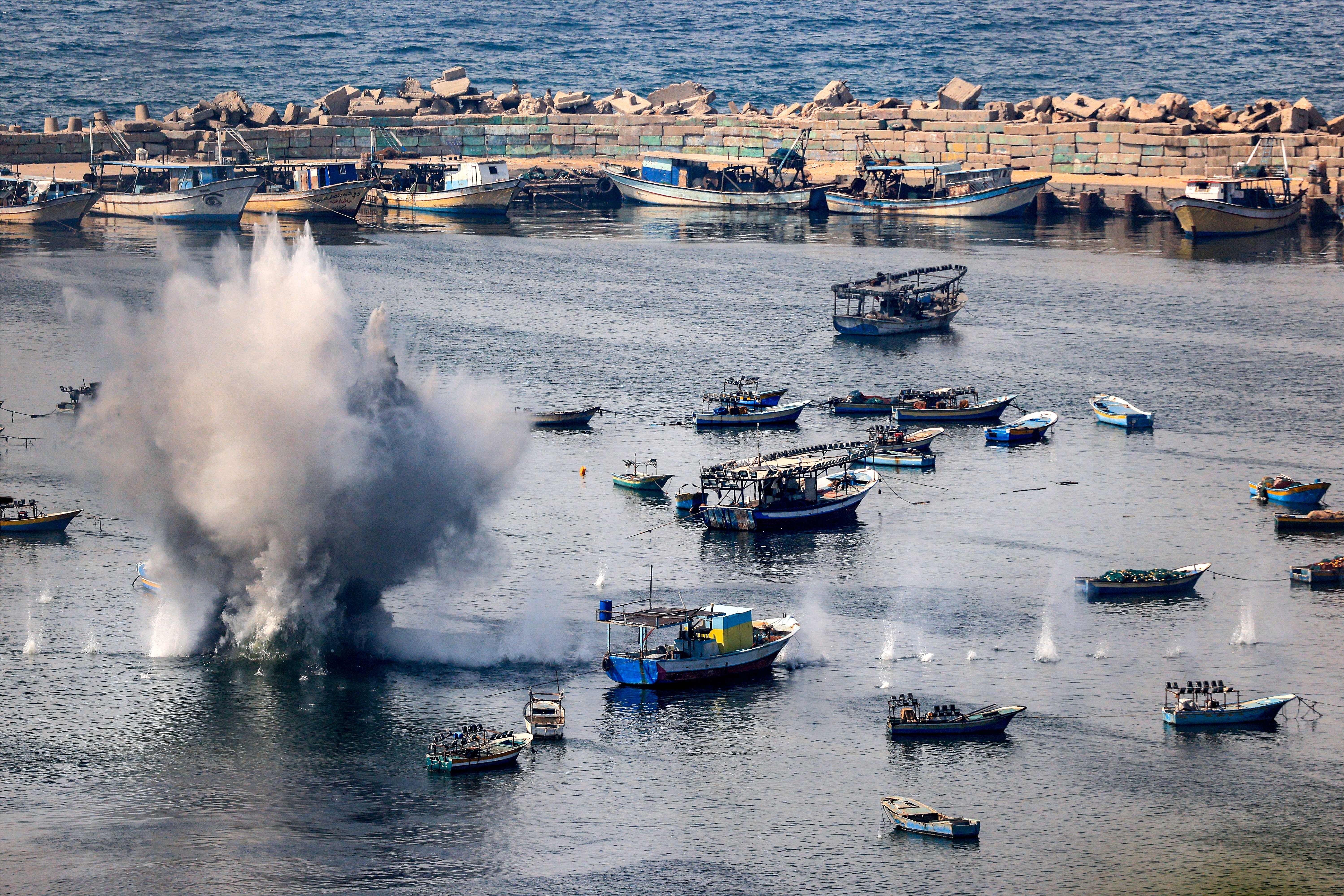 Wed., Oct. 11: Shells from Israeli bombardment land in the water in the Gaza City seaport.