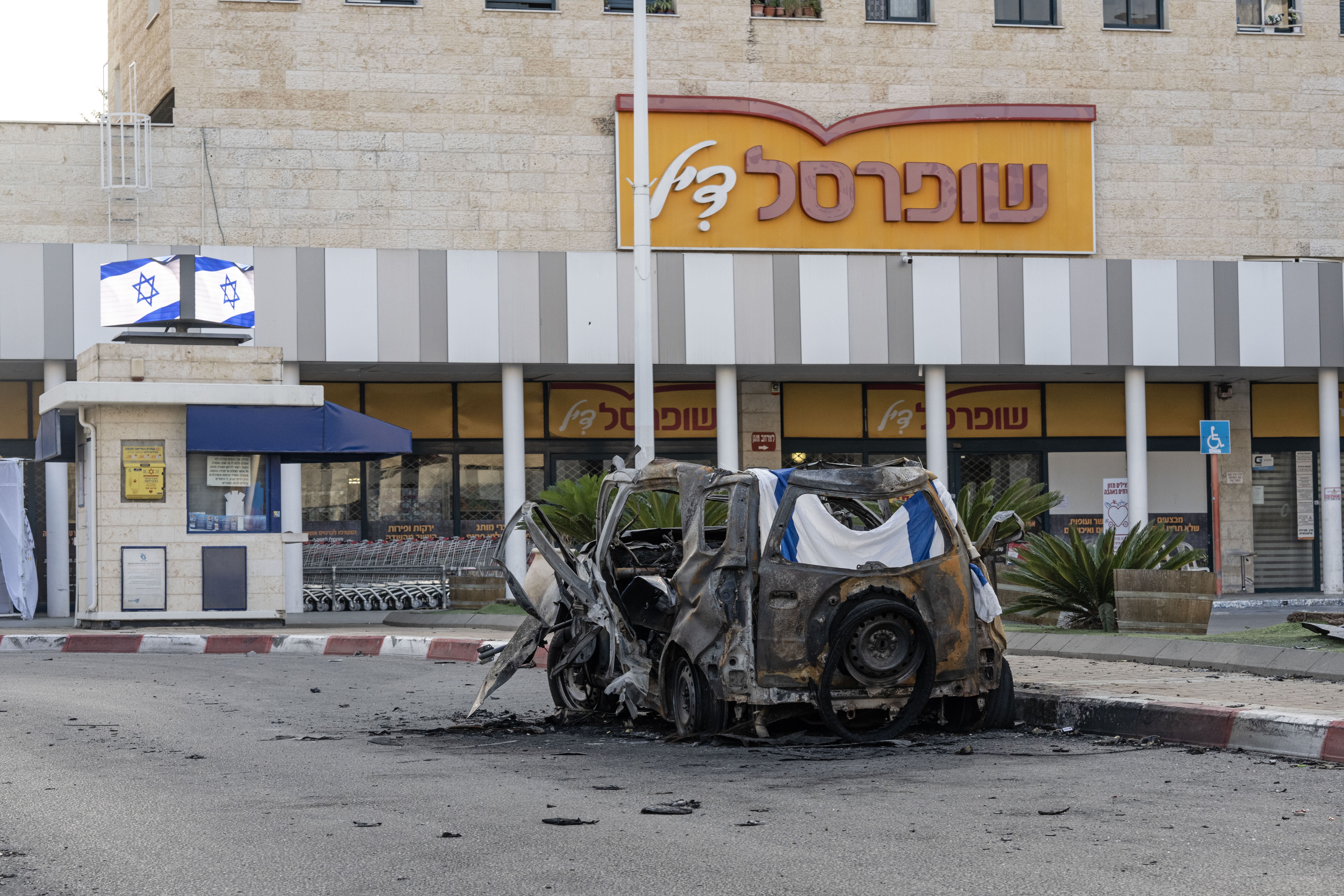 Left behind, in an assaulted Israeli town 7 A destroyed van in Sderot, Israel.