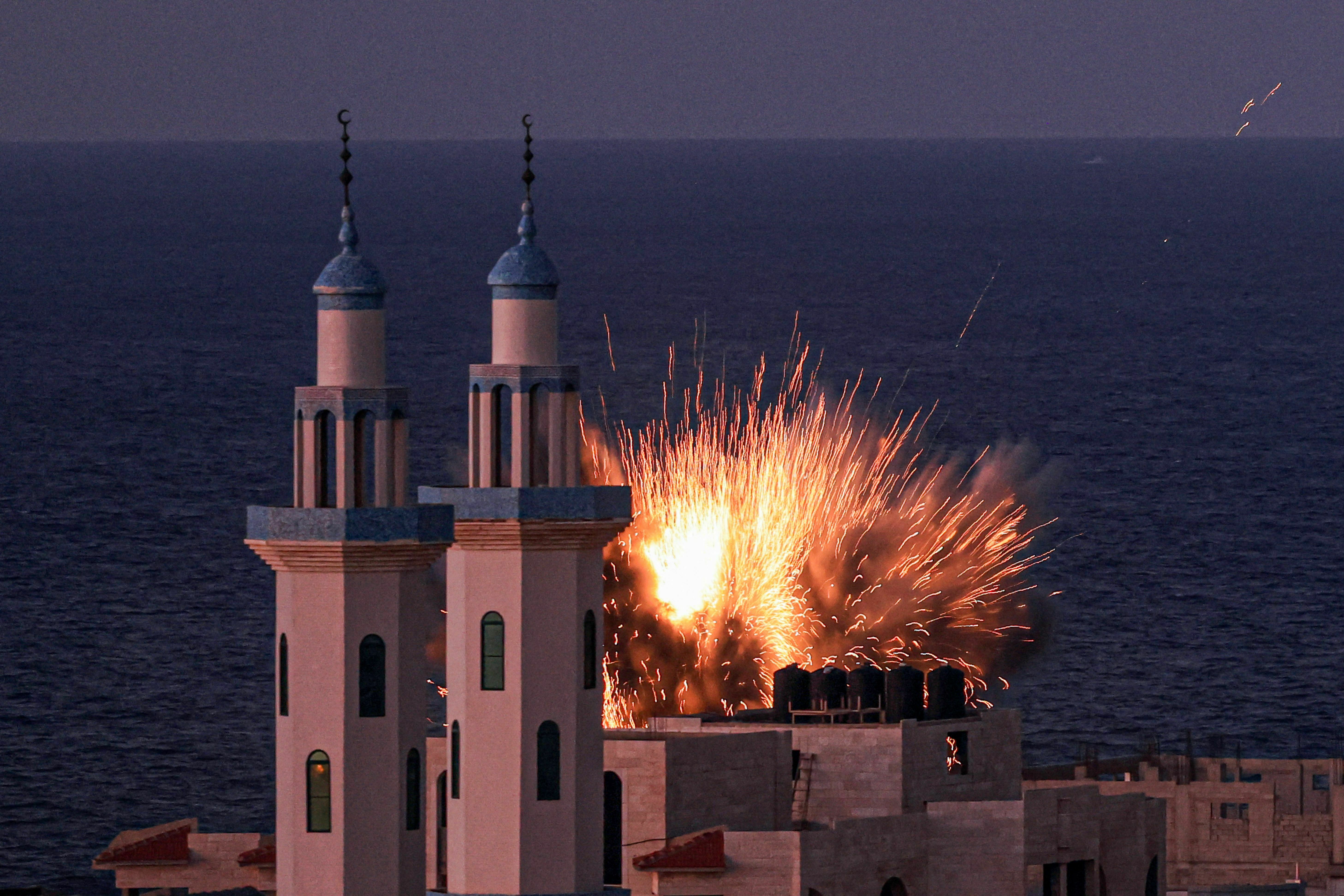 Thu., Oct. 12: A fireball erupts from an Israeli airstrike in Gaza City.