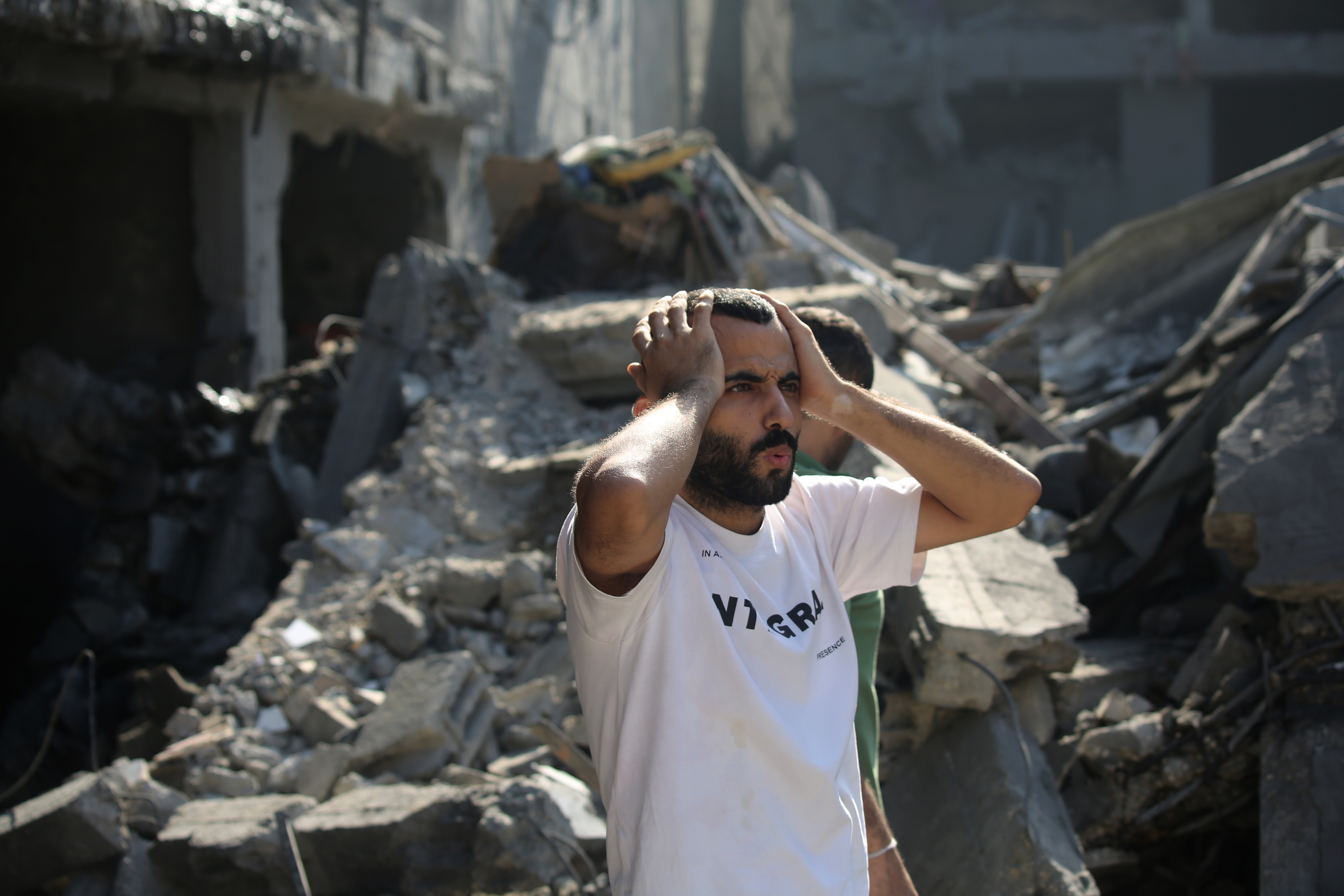 Thu., Oct. 12: Palestinian citizens inspect damage to their homes caused by Israeli airstrikes.