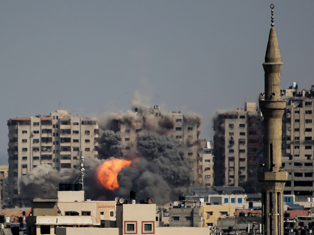 Israeli forces strike a residential tower in Gaza City on Thursday. (Getty Images)