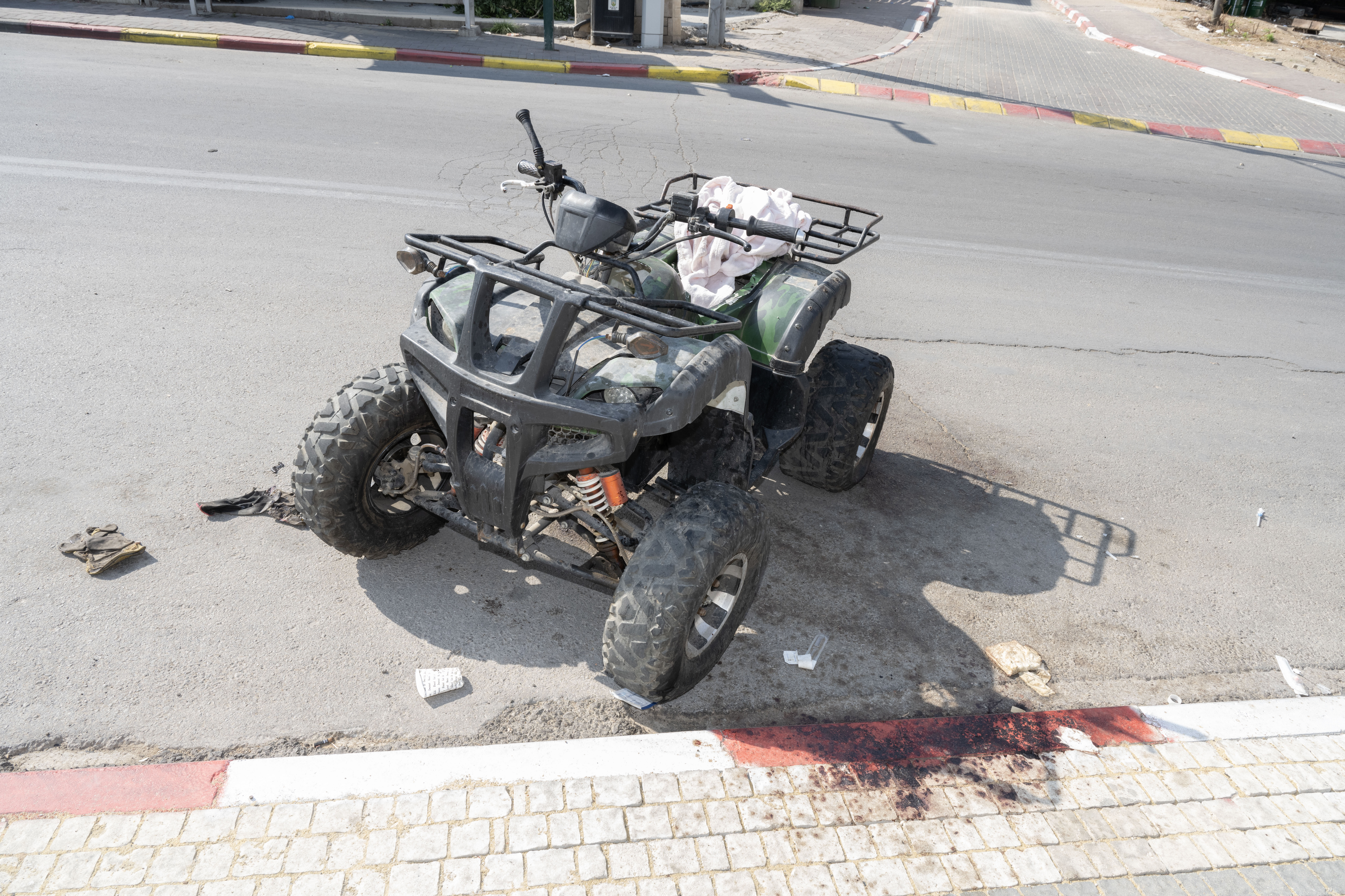 Left behind, in an assaulted Israeli town 5 An abandoned quad bike caked with blood in Sderot, Israel.