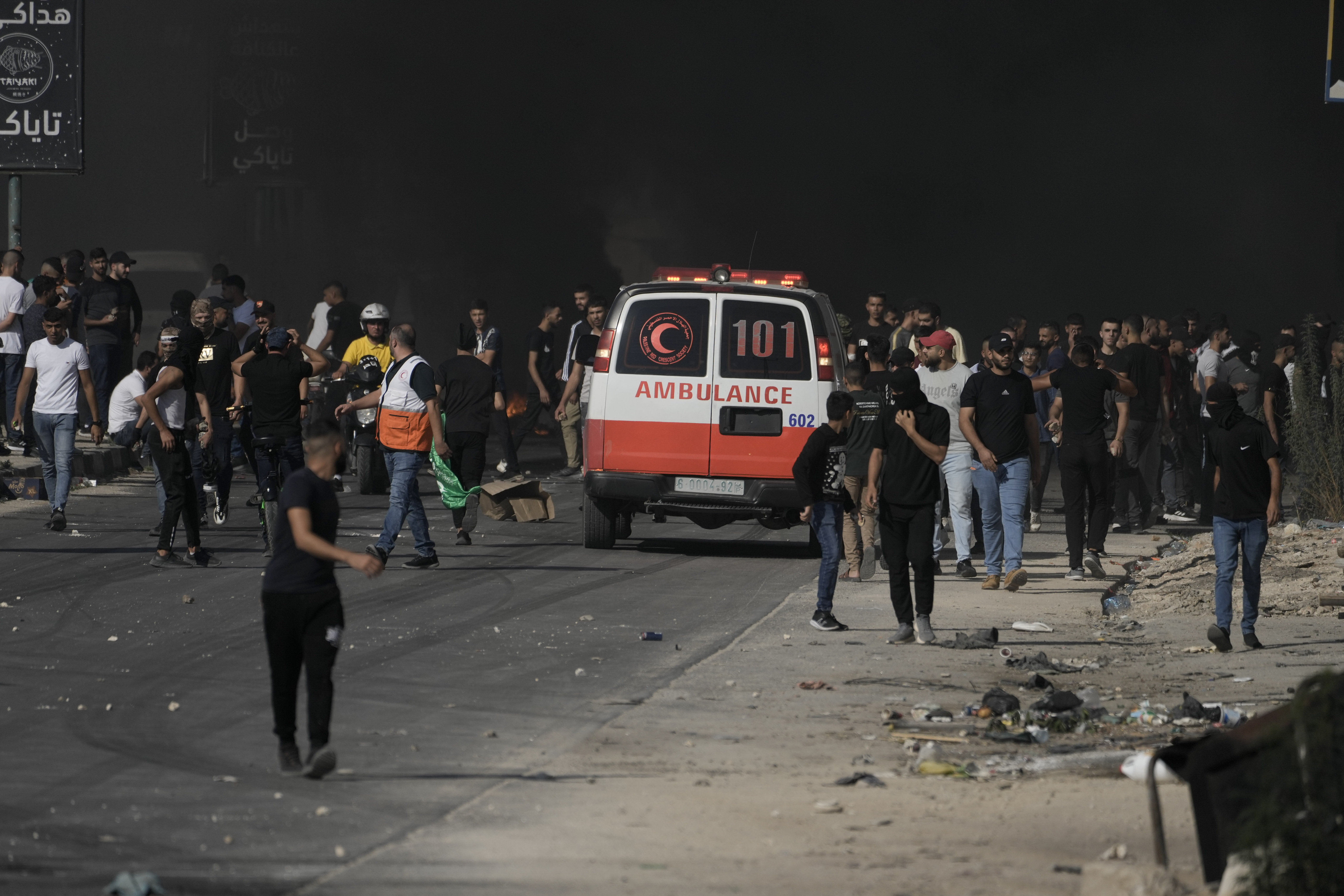 Fri., Oct. 13: Palestinian demonstrators clash with Israeli forces following a demonstration in support of the Gaza Strip, in the West Bank city of Nablus.