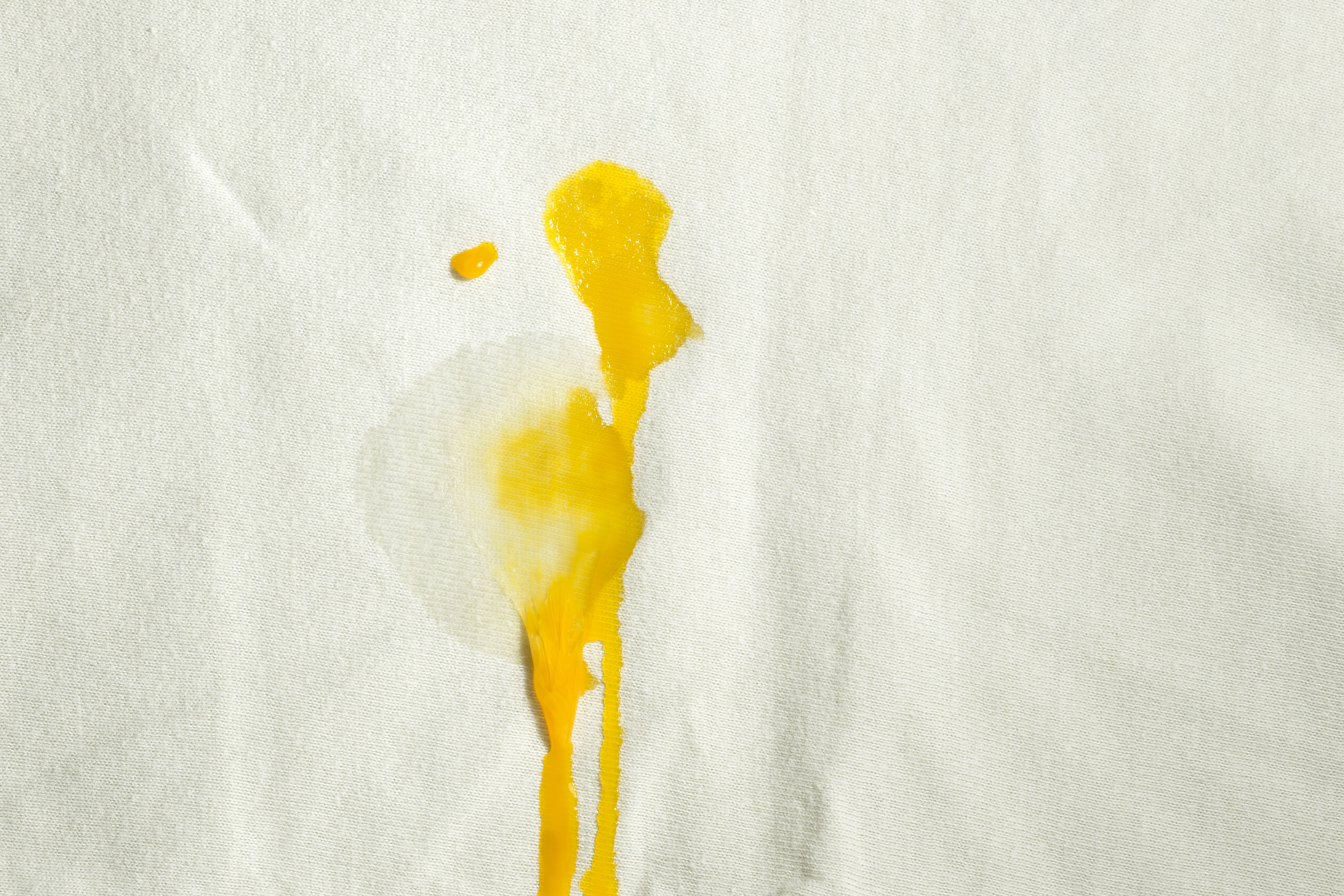 To make your washing loads more effective, pre-treat your stains, says Richardson. He recommends spritzing the stain with a 50-50 mix of white vinegar and water.
