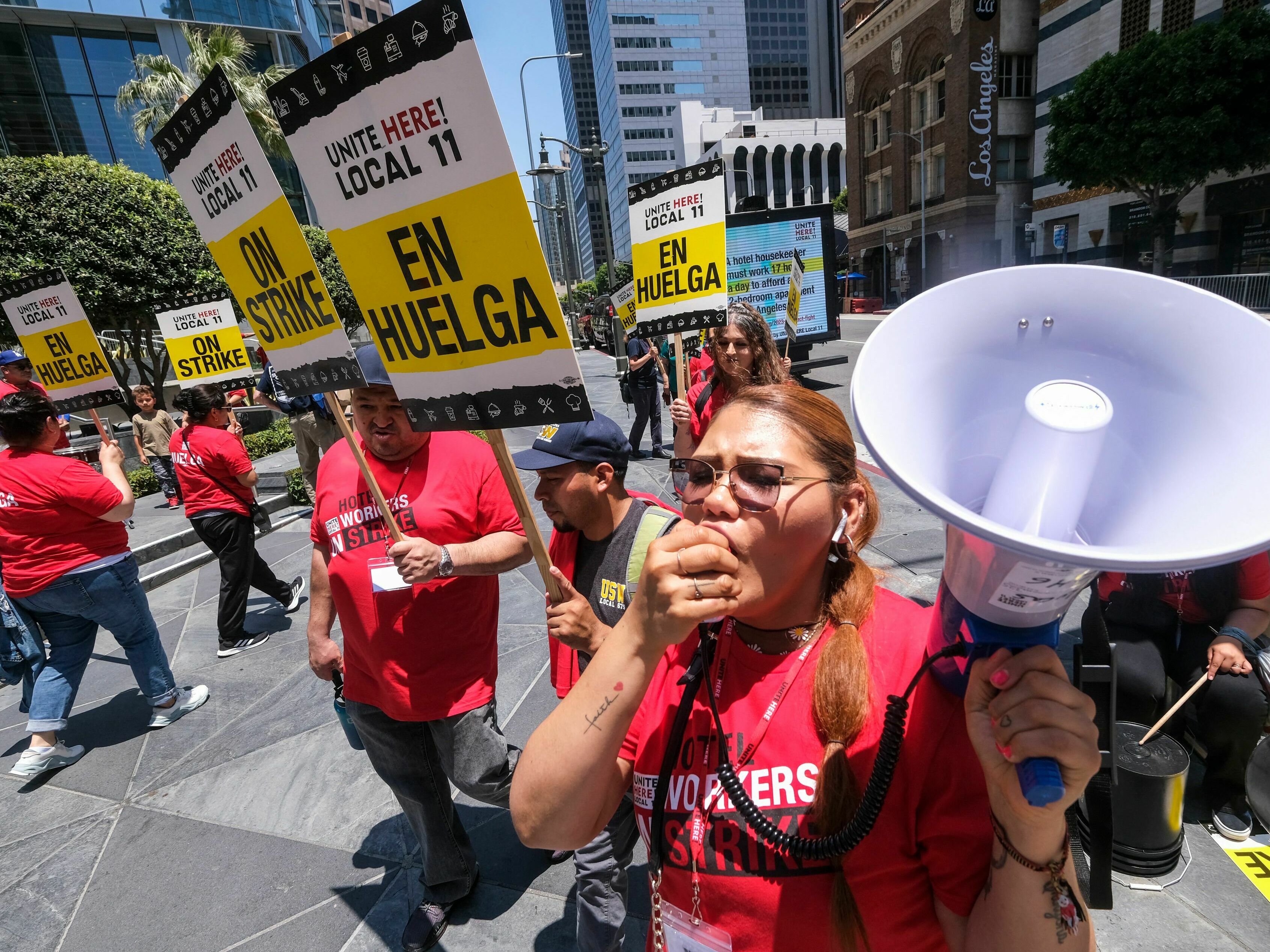 Striking hotel workers walk the picket line in Los Angeles, California, on July 2, 2023. (AFP via Getty Images)