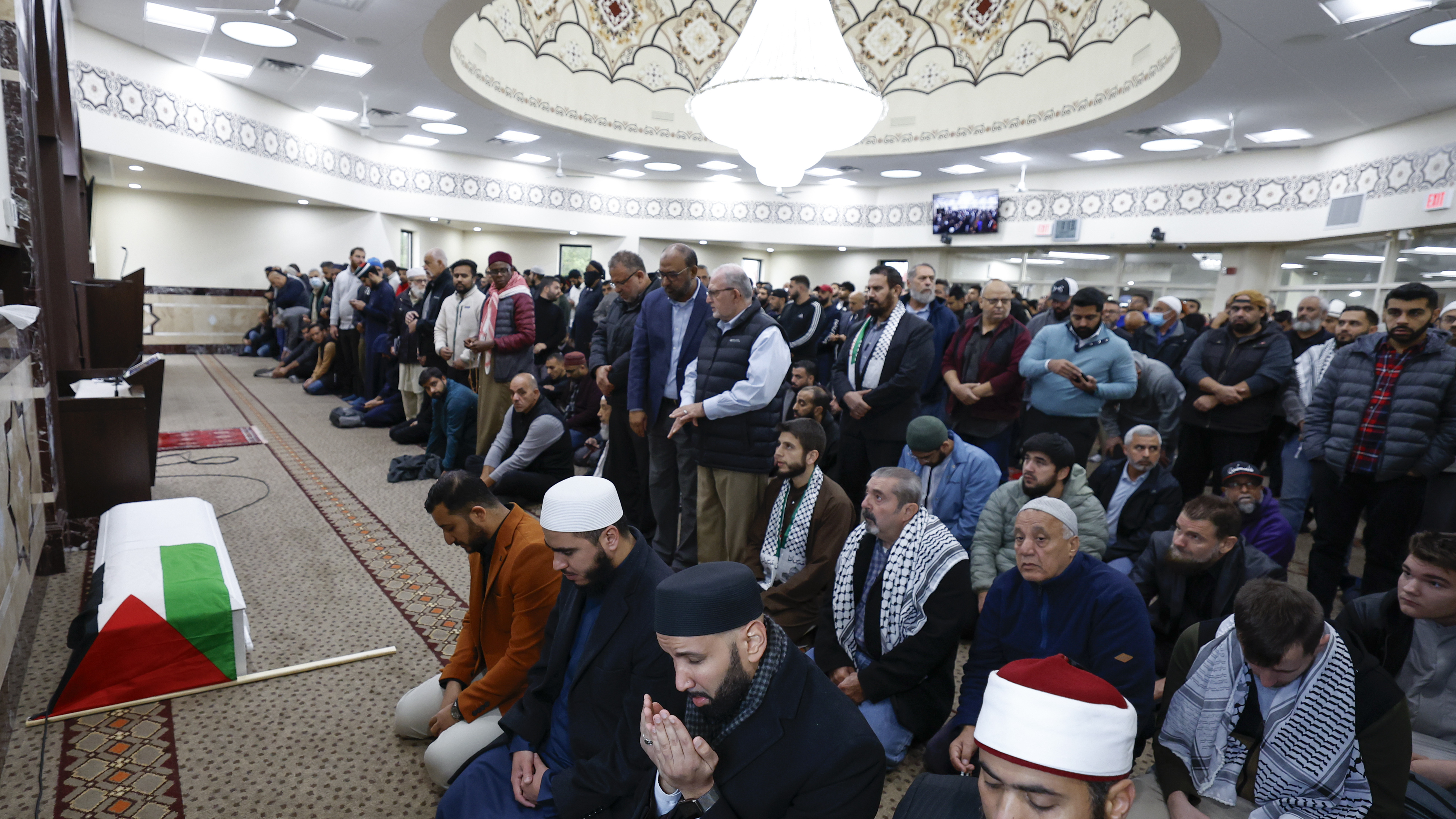Community members pray during a funeral service for 6-year-old Wadea Al-Fayoume at the Mosque Foundation on Monday, Oct. 16, 2023, in Bridgeview, Ill.