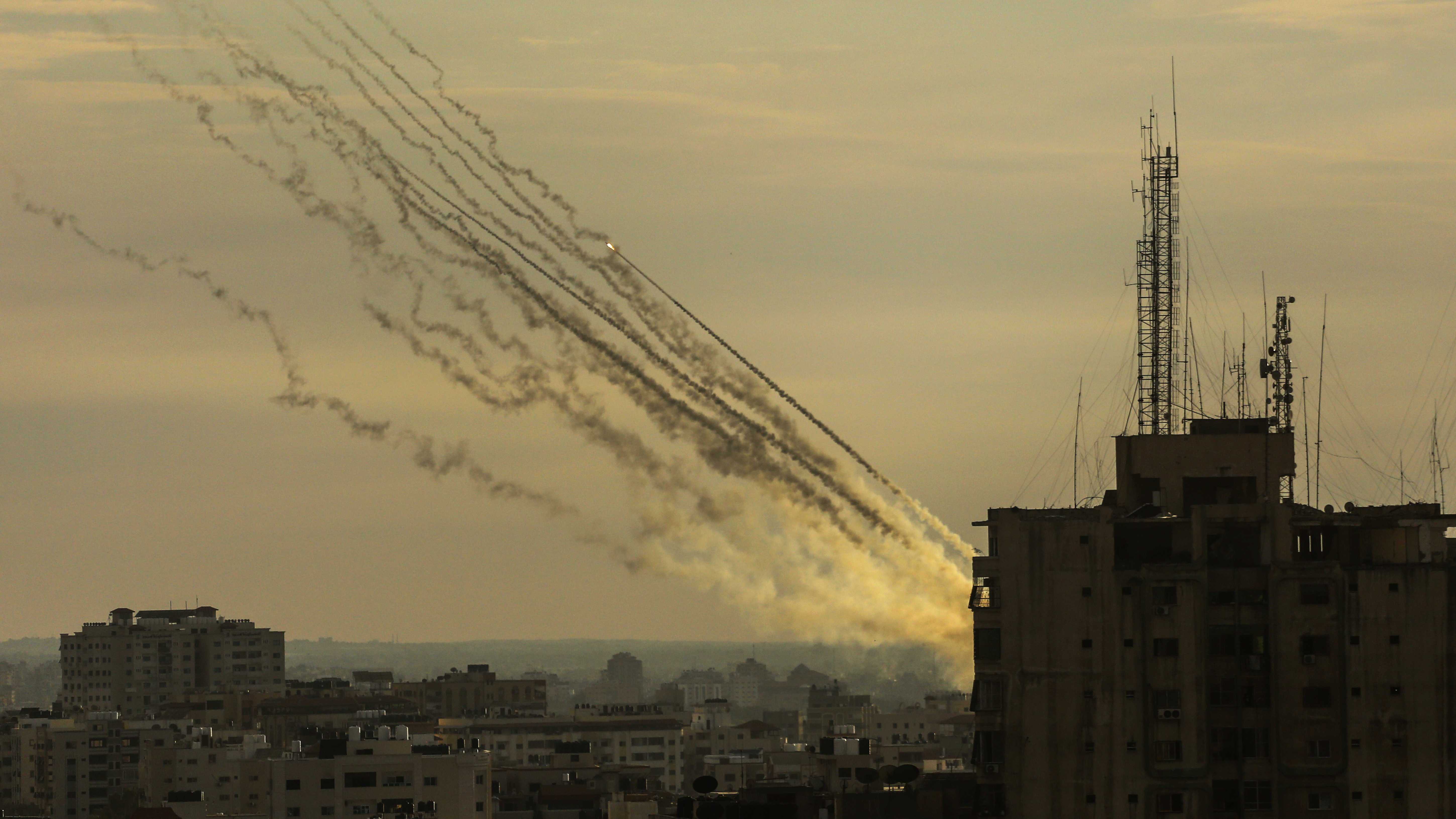 Palestinian militants fire rockets into Israel from Gaza Strip, Oct. 7.