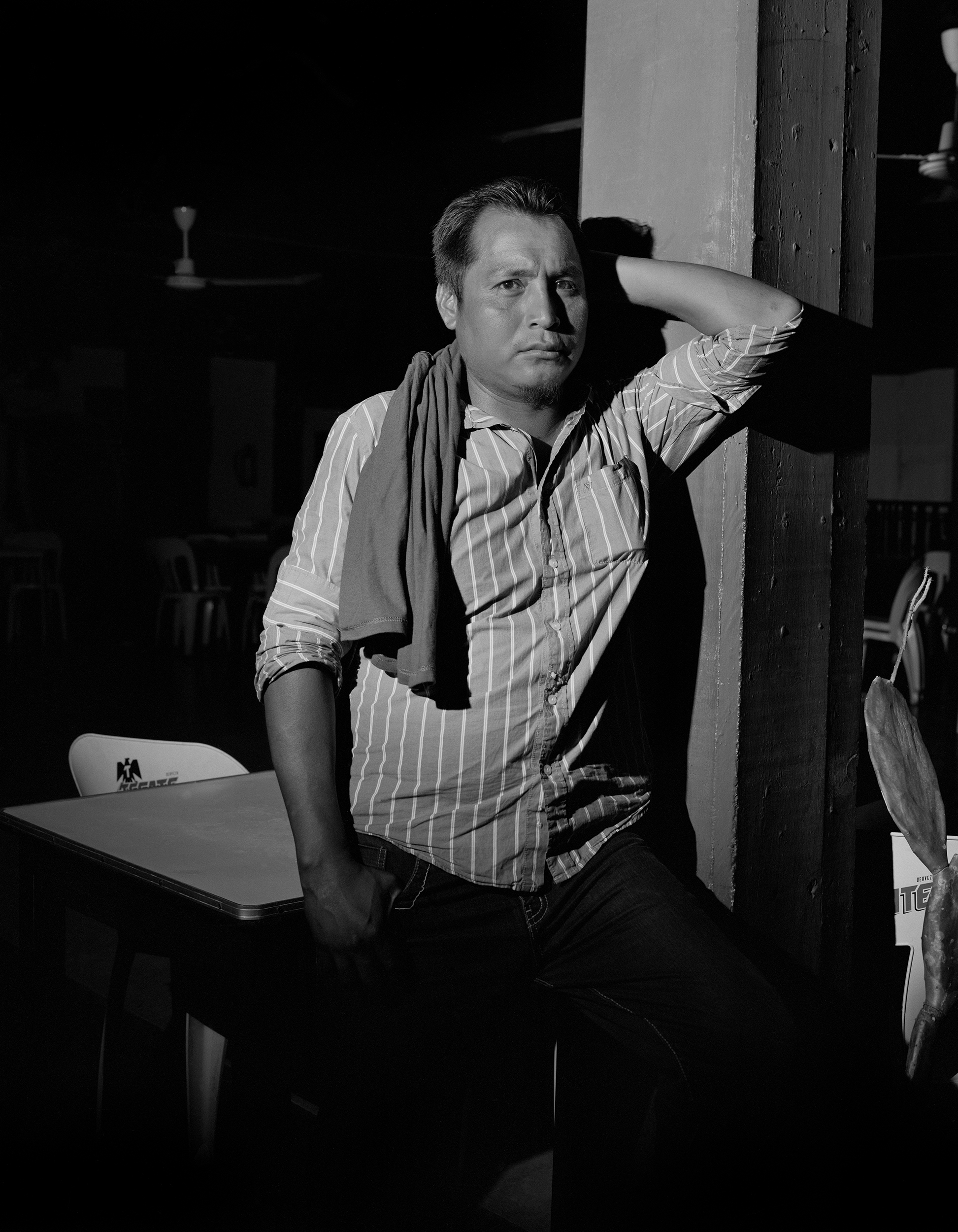 8 portraits that capture the working class of Monterrey, Mexico, through its cantinas 4 Waiter: Daniel said he was always busy and on the go, trying to keep the cantina clean.