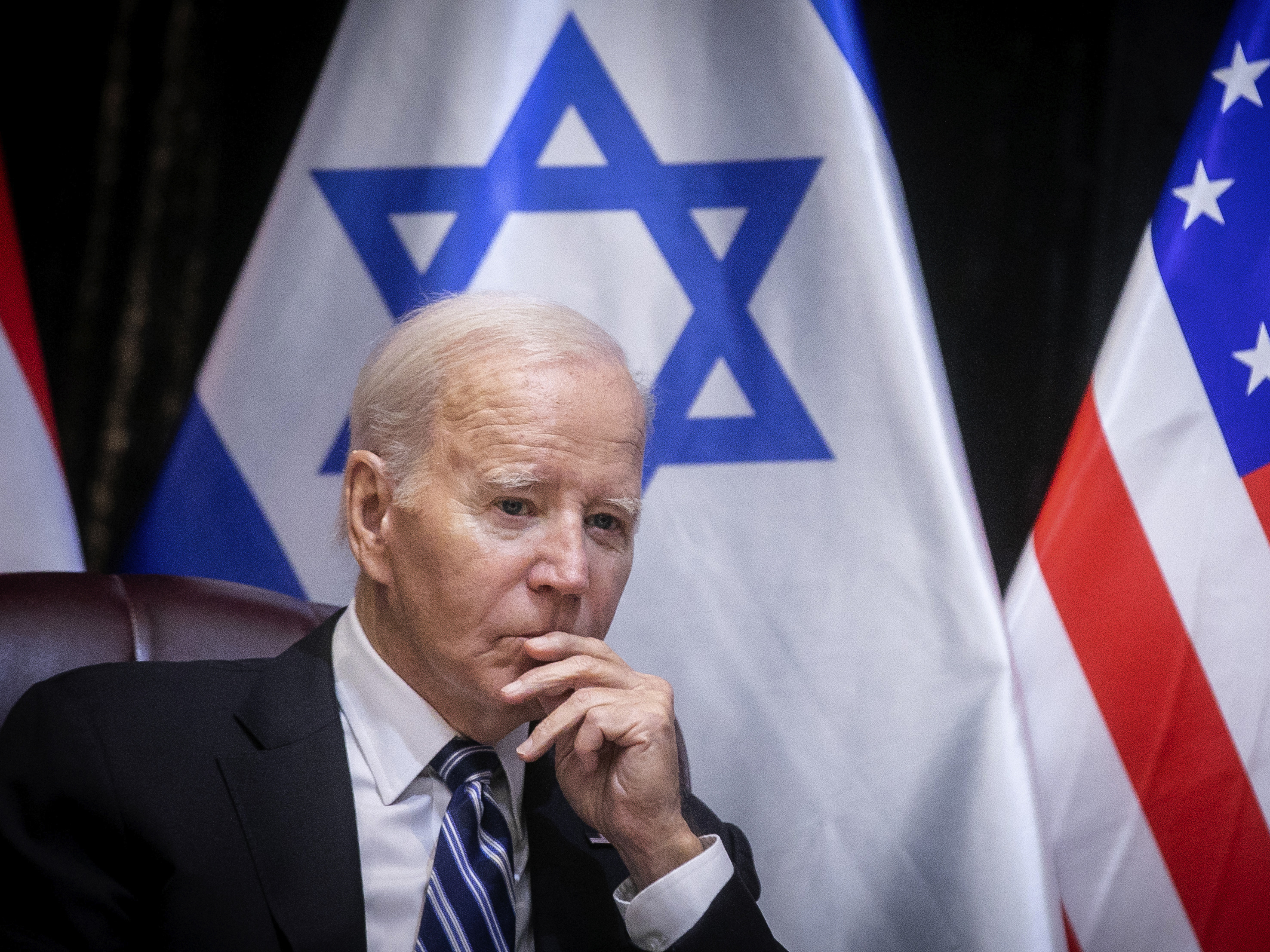 U.S. President Joe Biden pauses during a meeting with Israeli Prime Minister Benjamin Netanyahu to discuss the war between Israel and Hamas, in Tel Aviv, Israel, Wednesday, Oct. 18, 2023. (Miriam Alster/Pool Photo via AP)