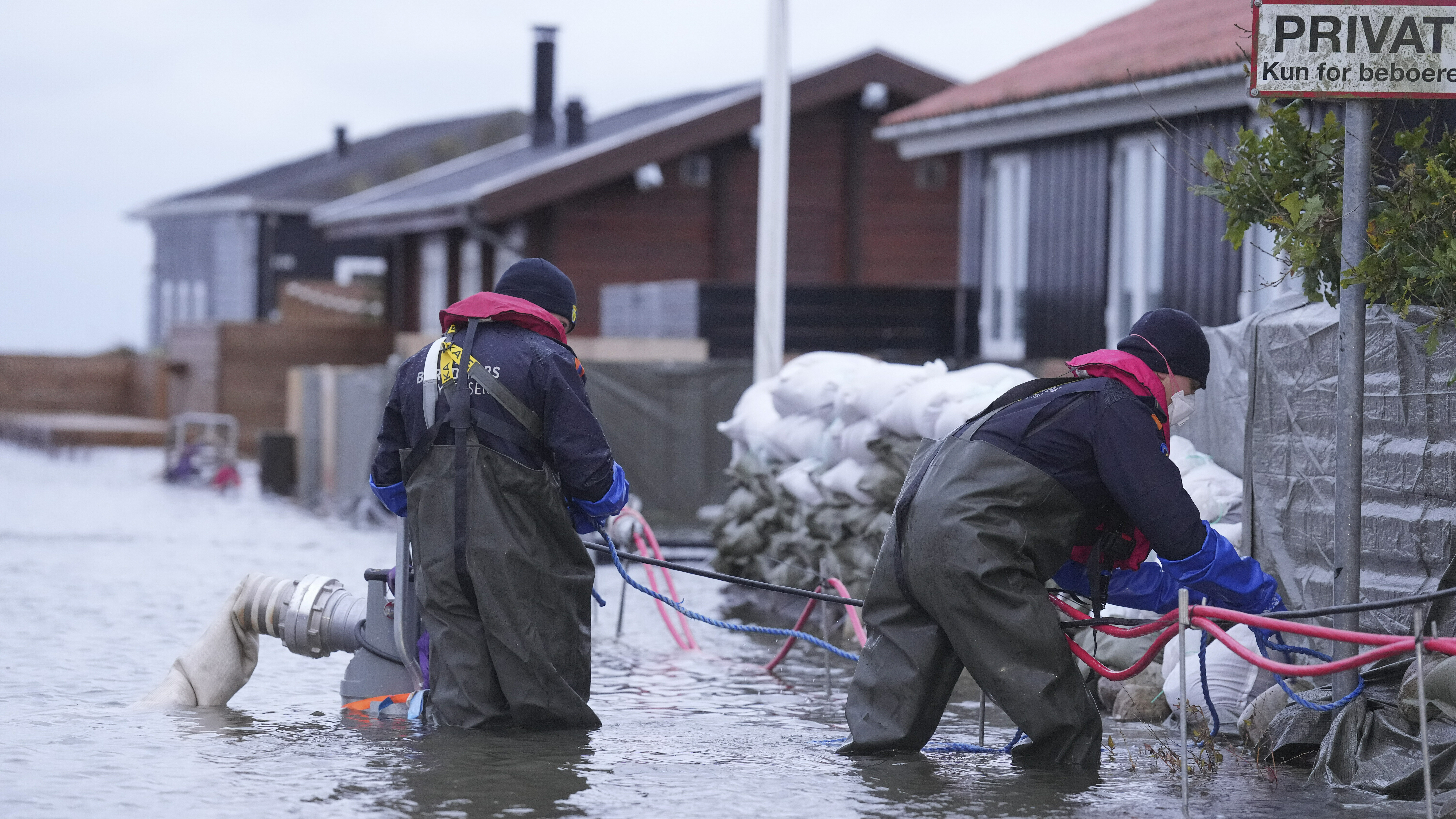 Gale-force winds and floods strike northern Europe, killing at least 3 in the U.K. 