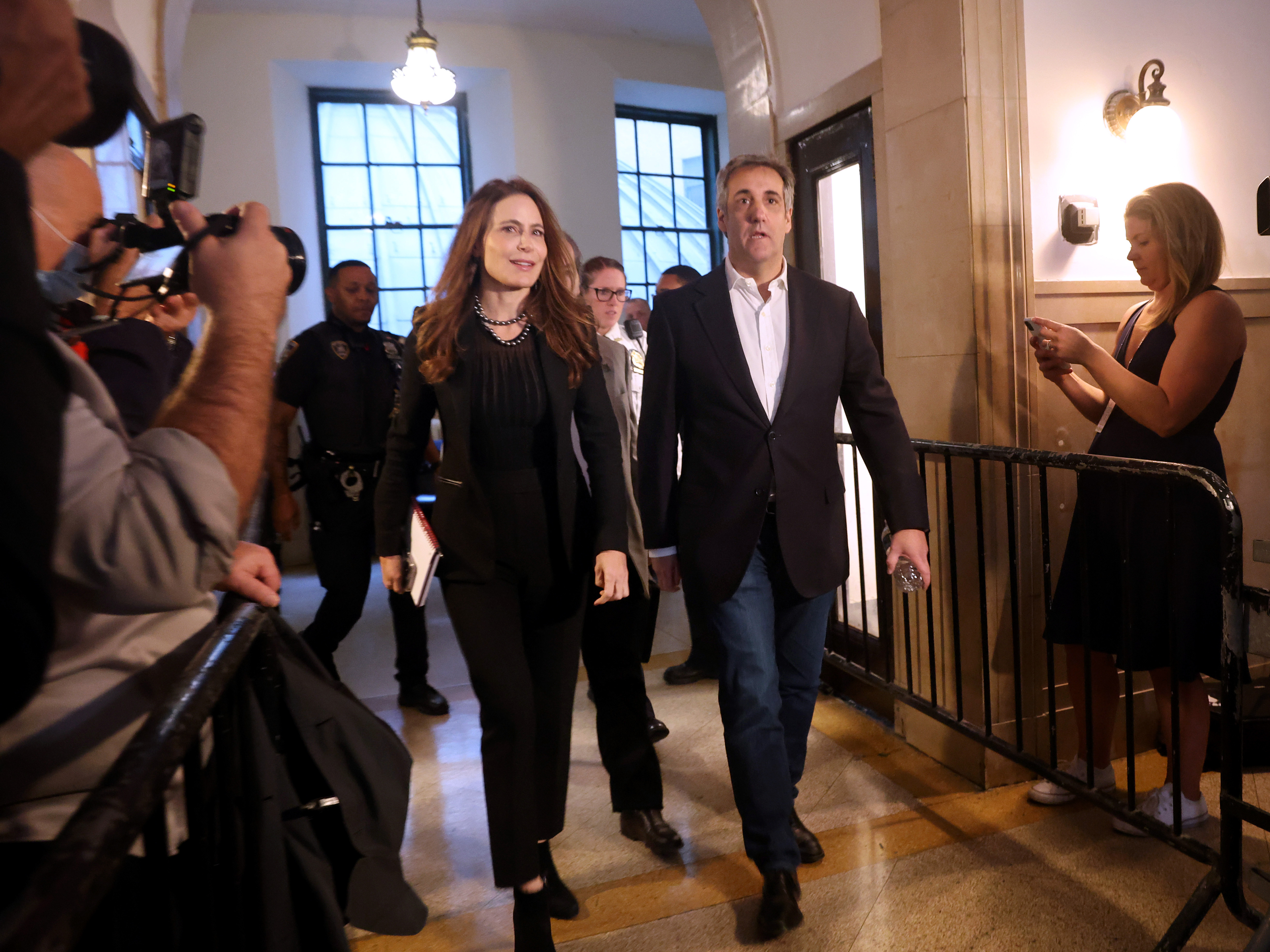 Former President Donald Trump's former lawyer Michael Cohen and his attorney Danya Perry arrive at Trump's civil fraud trial at New York State Supreme Court.
