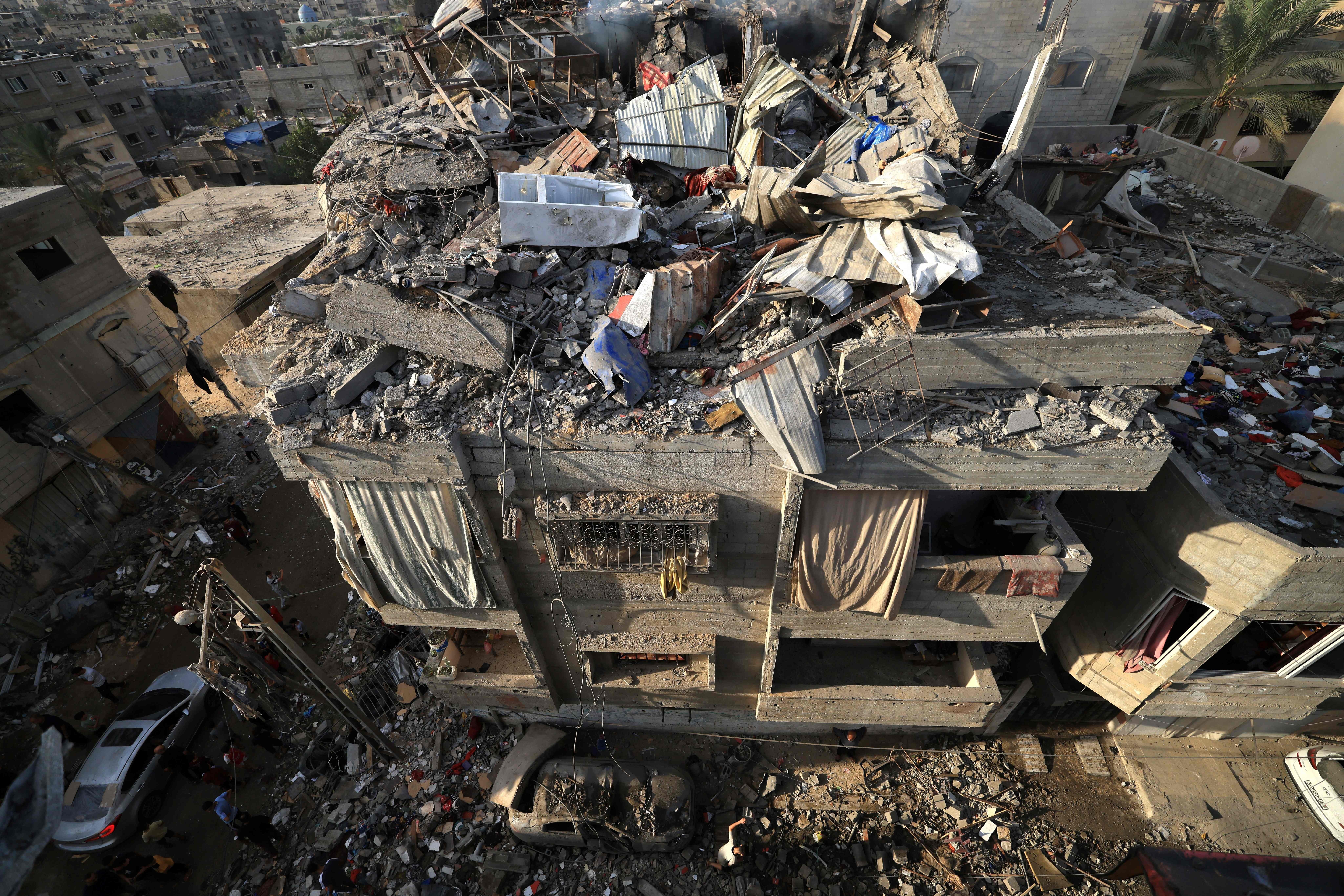 An overview of a destroyed building following Israeli bombardment of Khan Younis overnight into Friday.