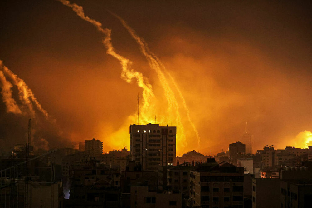 Smoke rises and billows in the Gaza Strip as the Israeli army conducts air attacks early Saturday local time. (Anadolu via Getty Images)