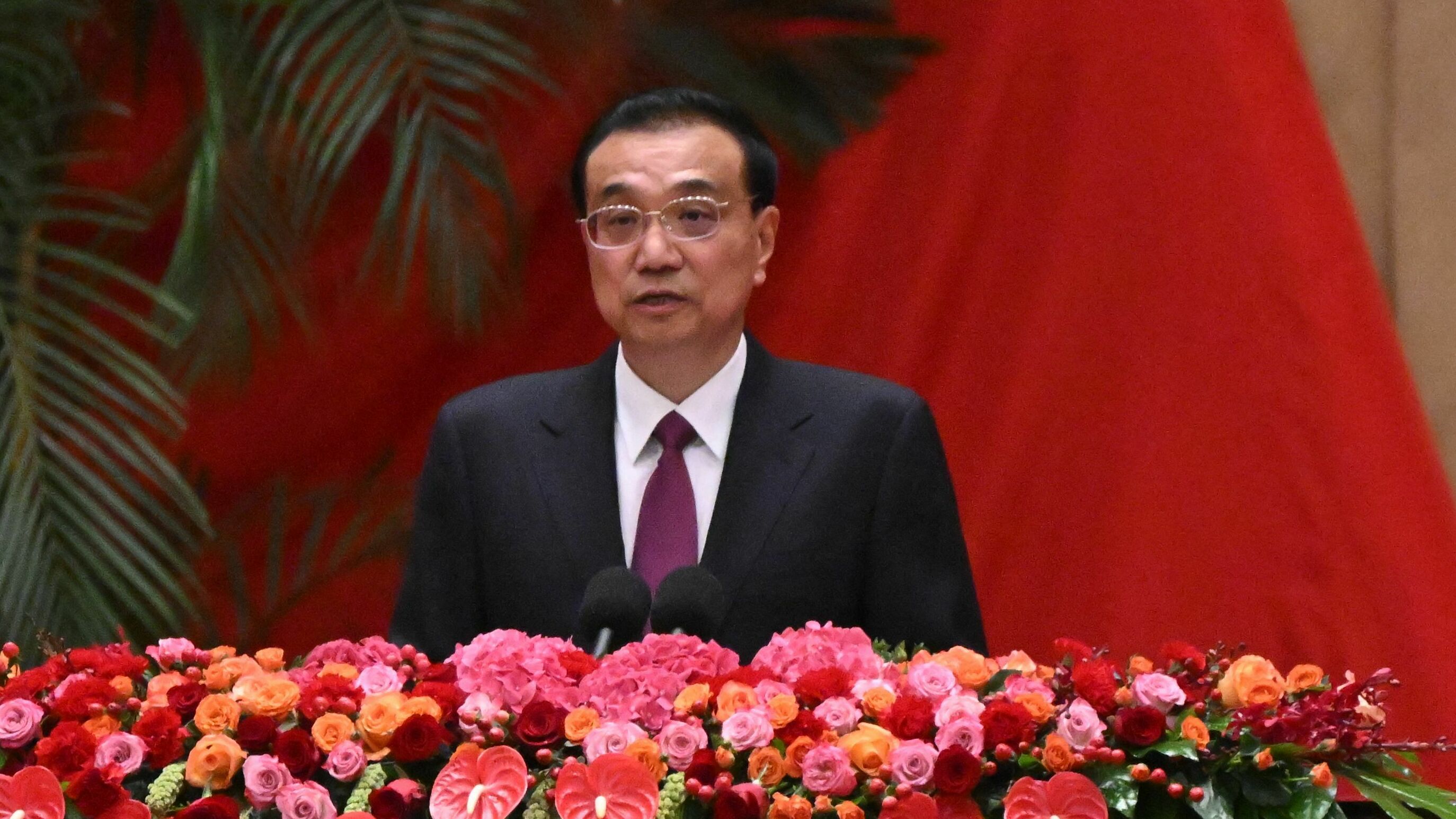 Chinese Premier Li Keqiang is shown speaking during a reception at the Great Hall of the People on the eve of China's National Day in Beijing on September 30, 2022.