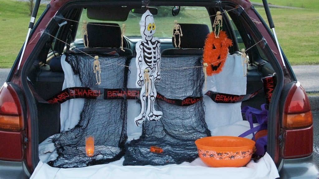 A car is open at a trunk-or-treat in 2014. The events allow children to collect candy from trunks of cars gathered in parking lots.