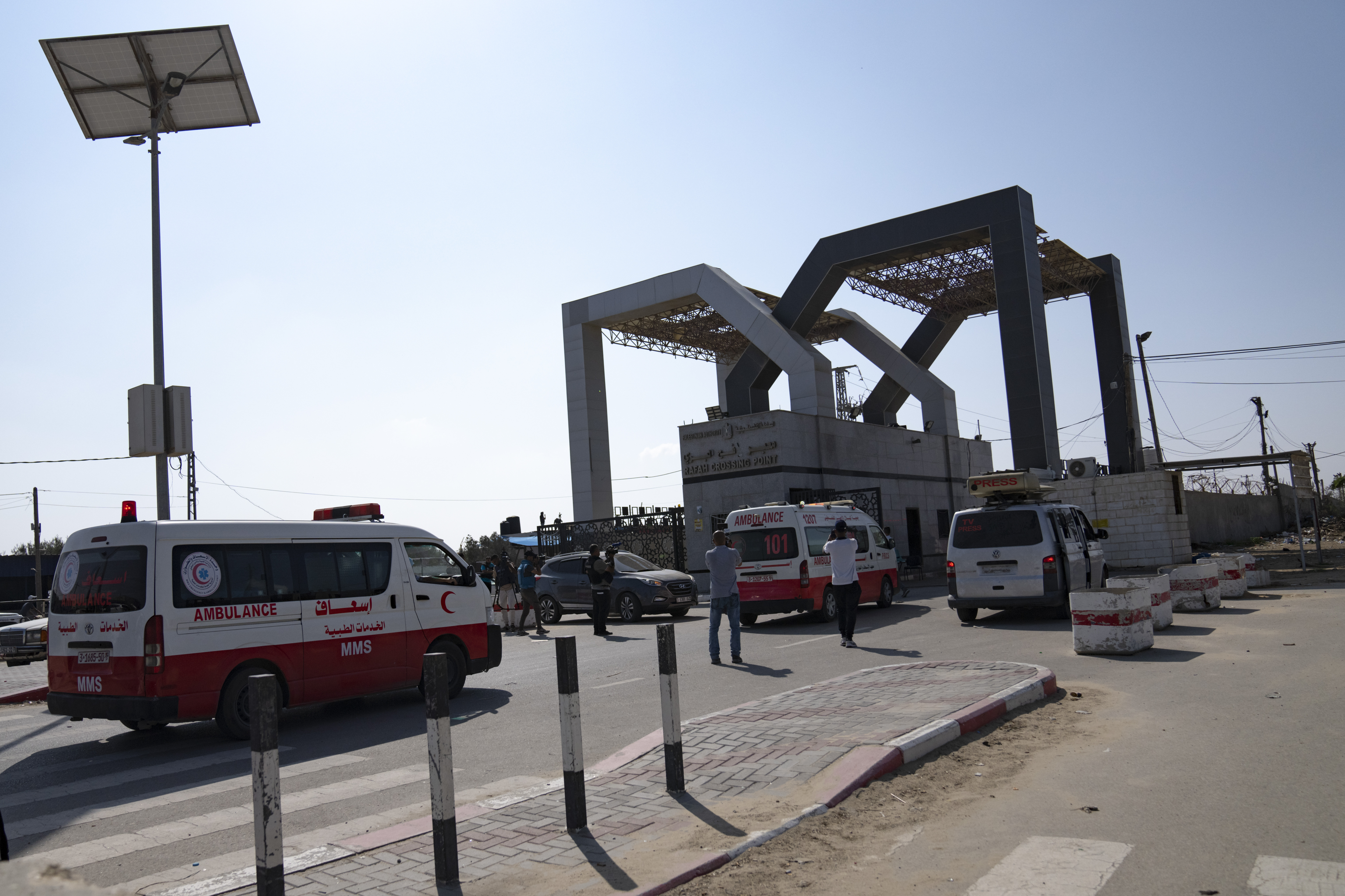 On the other side of the Rafah crossing from Gaza into Egypt ambulances waited to evacuate critically injured people from the besieged territory, where Israeli airstrikes have killed thousands.