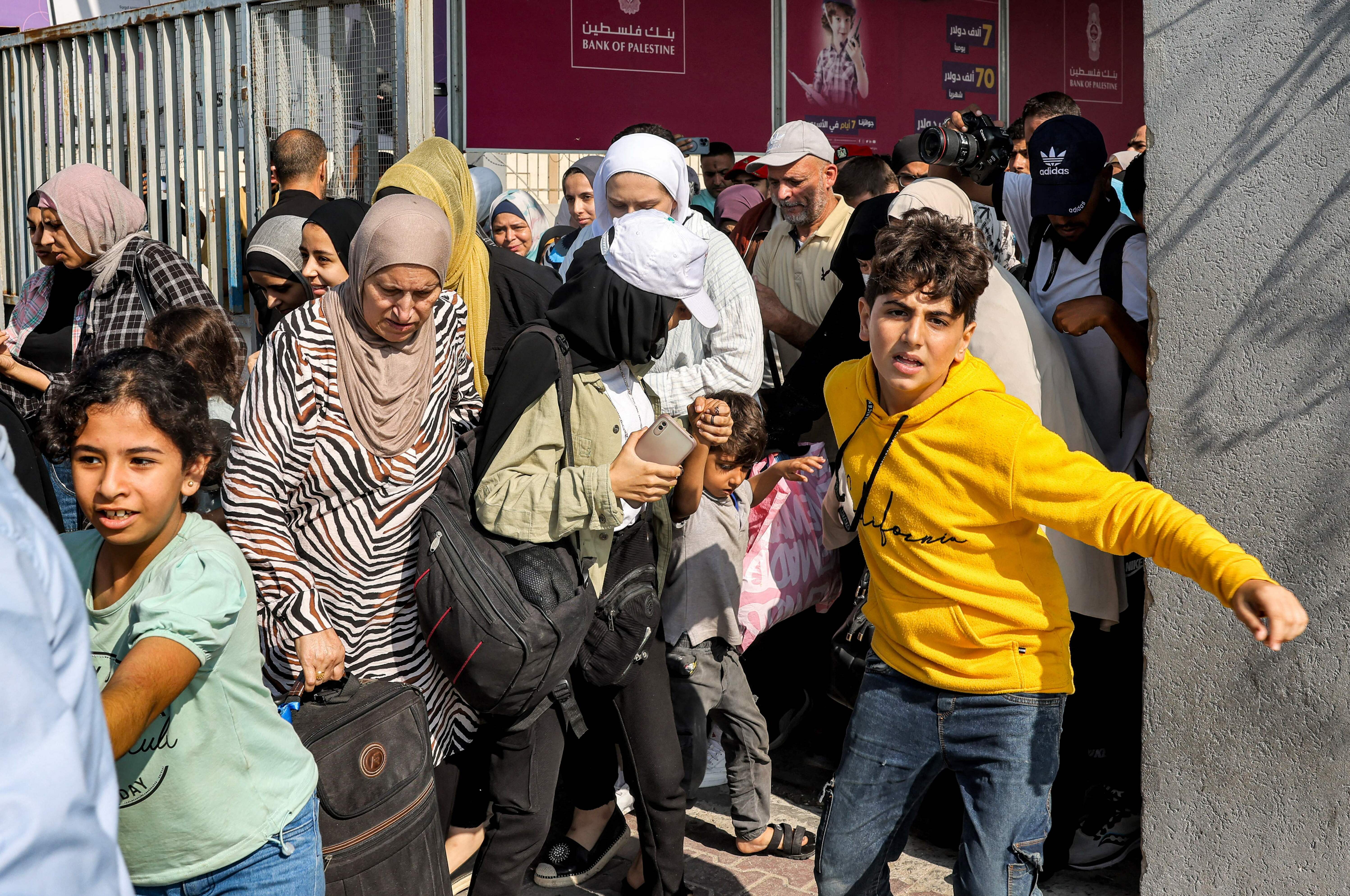 Scores of foreign passport holders trapped in Gaza started leaving the war-torn Palestinian territory on Nov. 1 when the Rafah crossing to Egypt was opened up for the first time since the Oct. 7 Hamas attacks on Israel. (AFP/Getty Images)