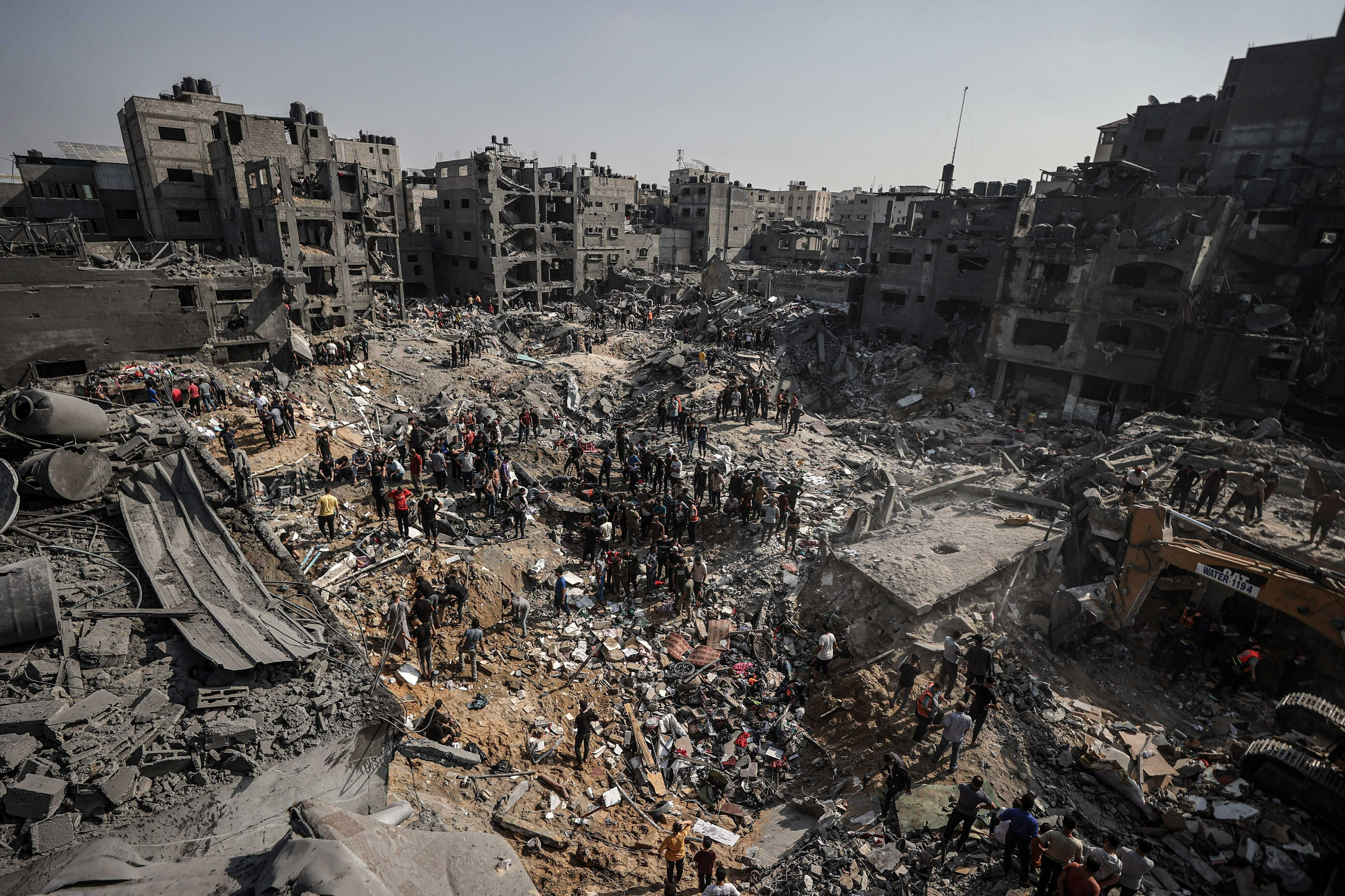 Palestinians conduct a search and rescue operation after the second bombardment by the Israeli army in the last 24 hours at Jabalia refugee camp in Gaza City, Gaza, on Wednesday. (Ali Jadallah/Anadolu via Getty Images)