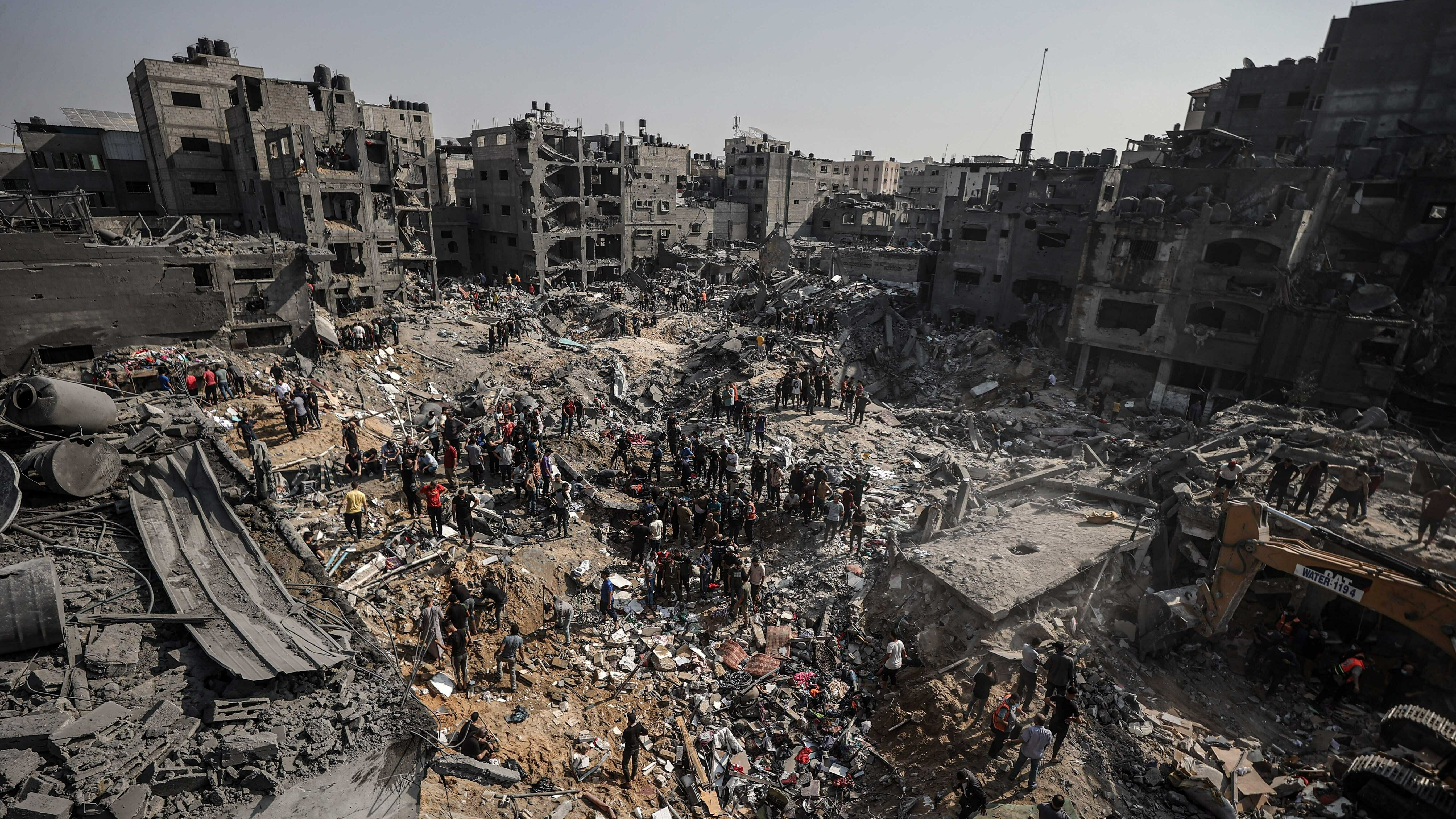 Palestinians conduct a search and rescue operation after the second bombardment by the Israeli army in the last 24 hours at Jabalia refugee camp in Gaza City, Gaza, on Wednesday.