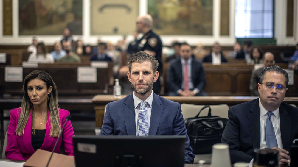 Eric Trump sits in the courtroom alongside his attorneys for his second day of testimony during his civil fraud trial at New York State Supreme Court on Friday in New York City. (Pool/Getty Images)