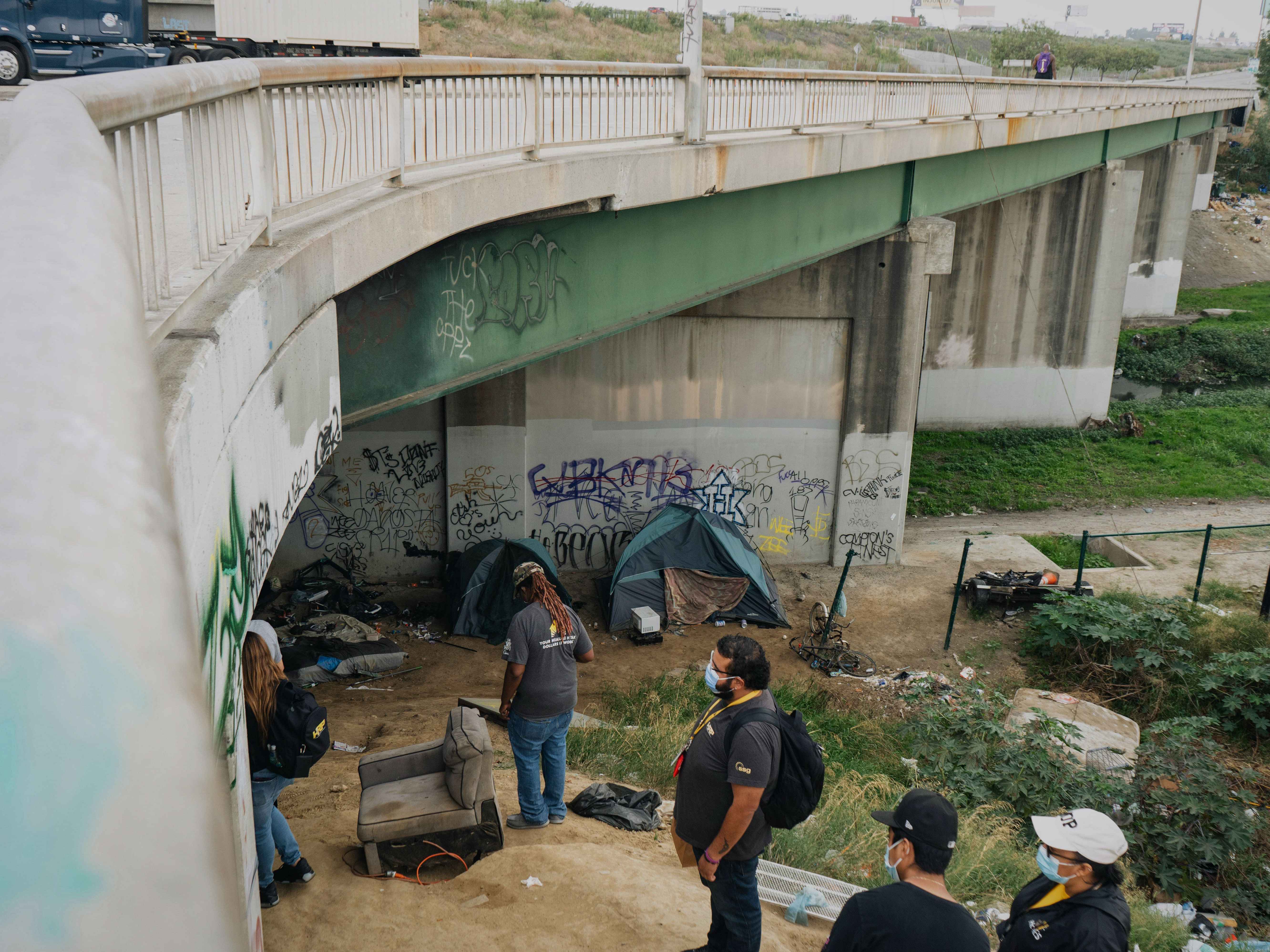 'Frustration all across the board.' A day with homelessness outreach workers in LA 2 The HOPICS outreach team checks on people living under a highway bridge in South Los Angeles on Sept. 21.