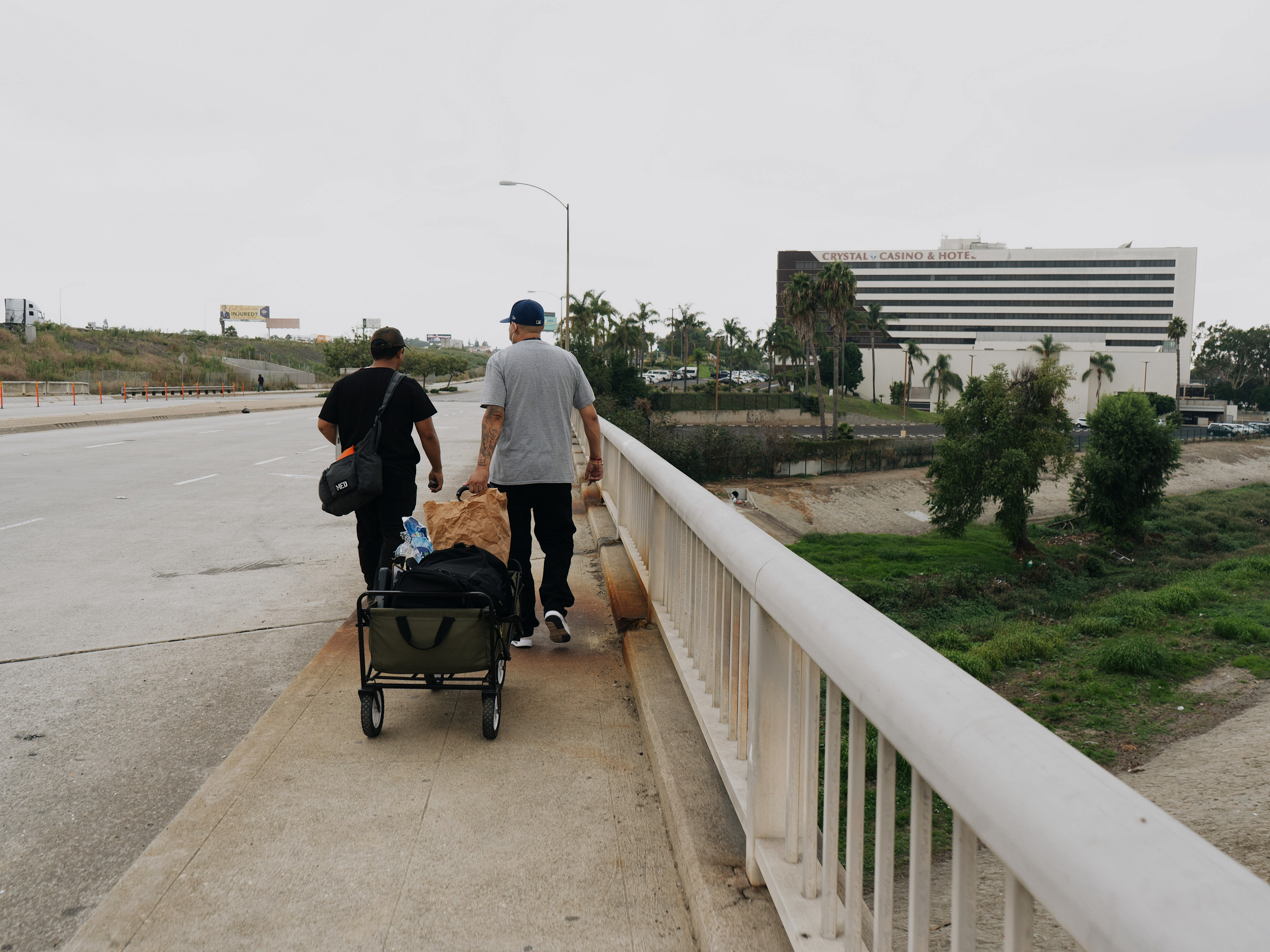 'Frustration all across the board.' A day with homelessness outreach workers in LA 10 HOPICS outreach workers head back to their vans after visiting a tent encampment.