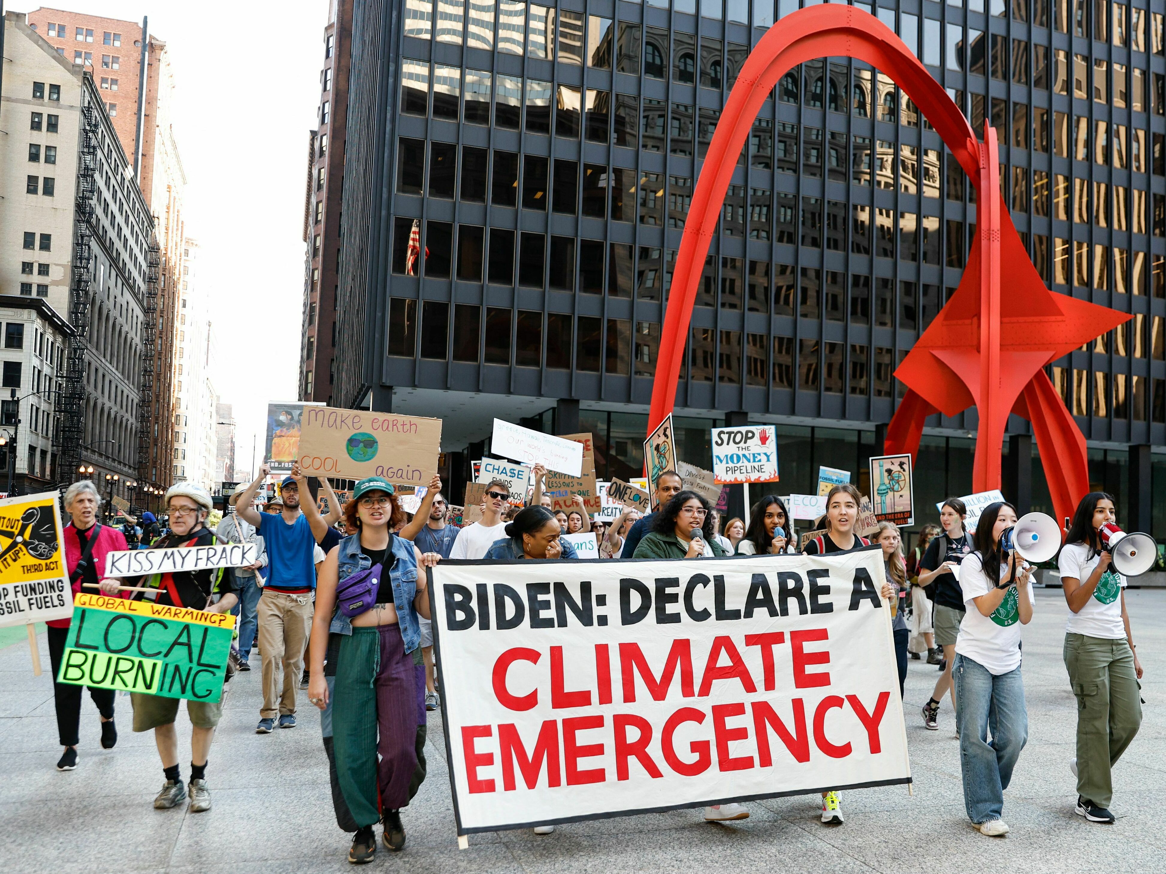 Environmental activists march during the Global Climate Strike in downtown Chicago on Sept. 15, 2023. Local groups across the United States are gathering to call for an end to the era of fossil fuels. (AFP via Getty Images)