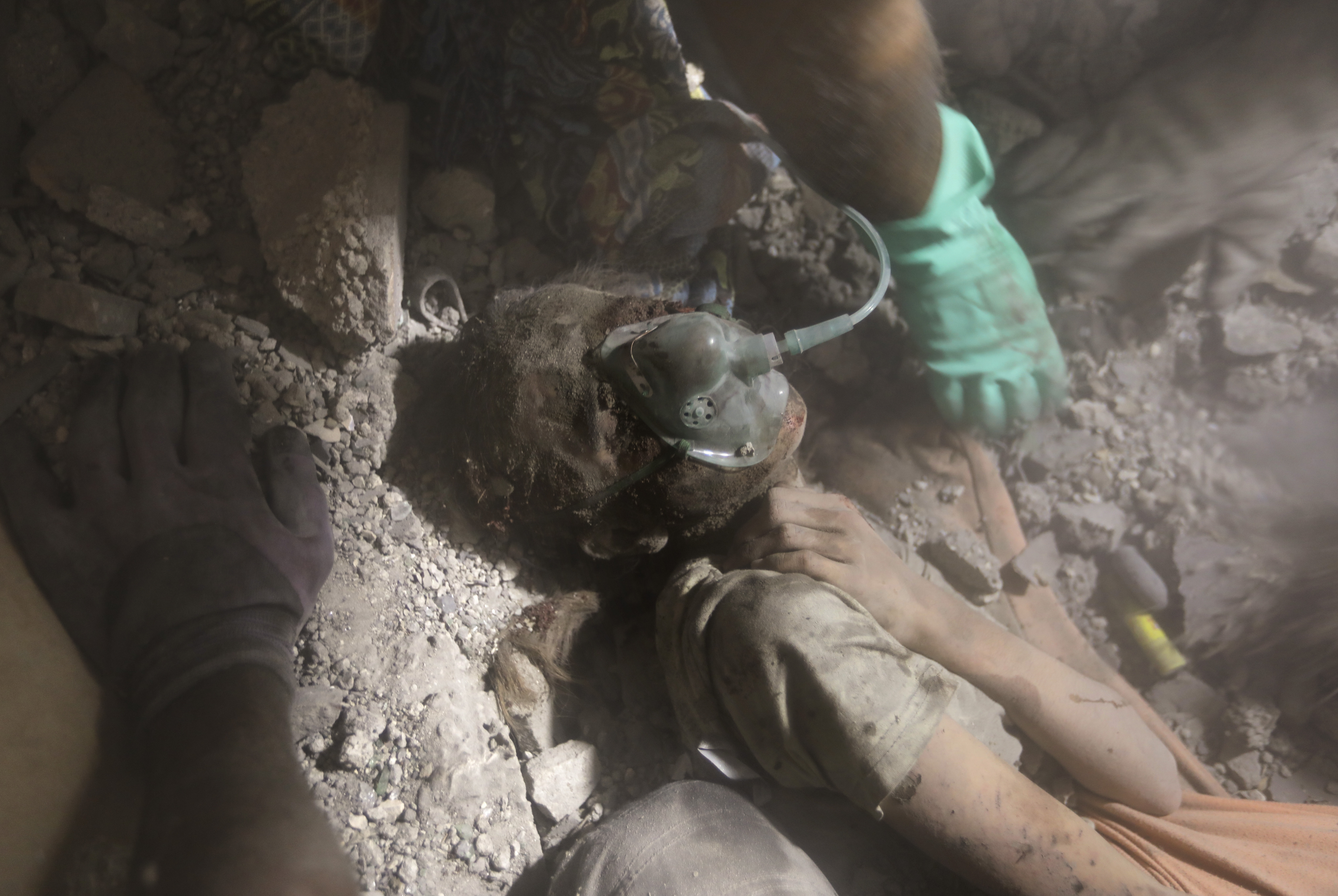 Tues., Nov. 7: Palestinians rescue a wounded girl from under the rubble of a destroyed building following an Israeli airstrike in Khan Younis refugee camp, southern Gaza Strip.