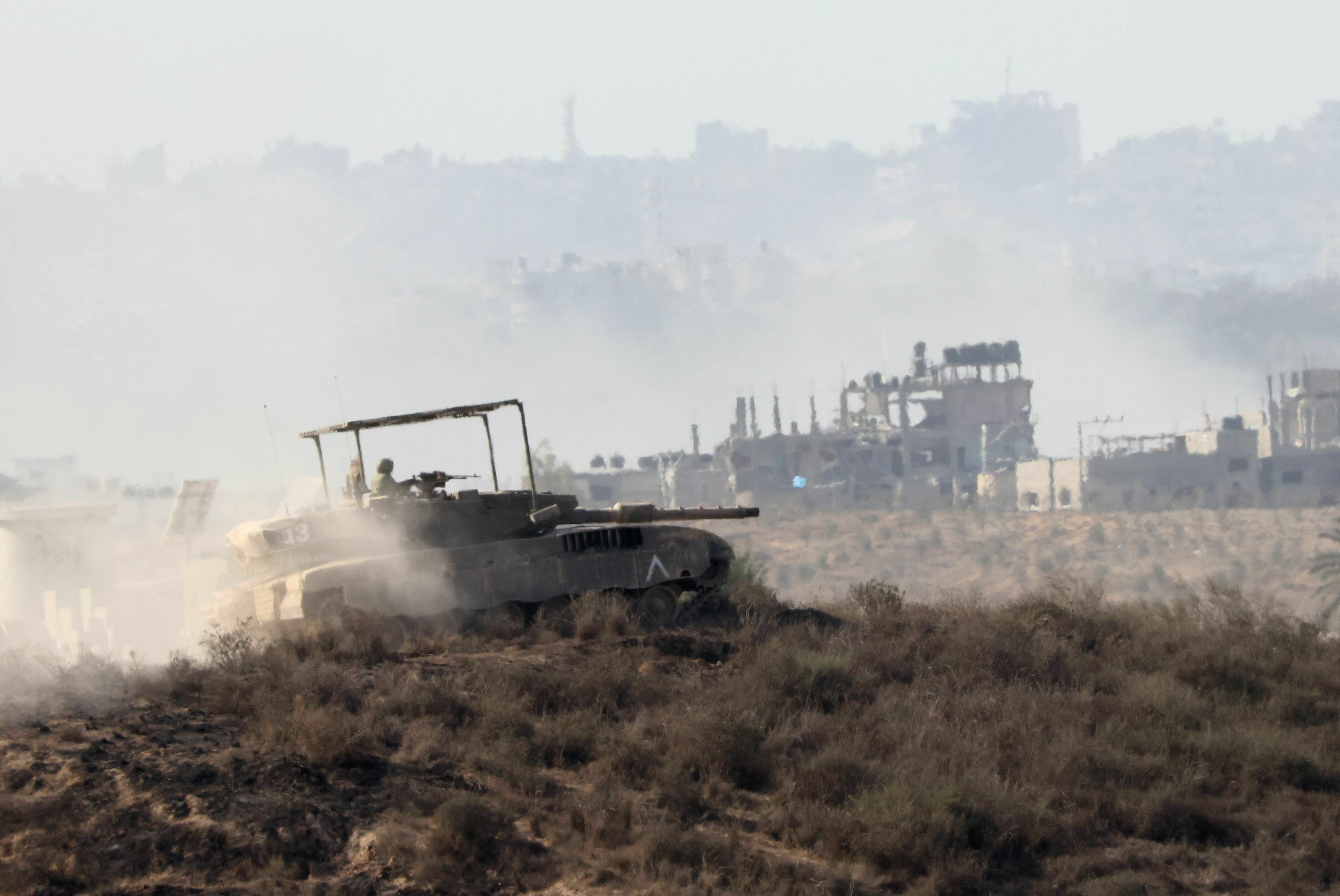 Fri., Nov. 10: This picture taken from the Israeli side of the border with the Gaza Strip shows an Israeli army tank in the northern part of the Palestinian enclave.