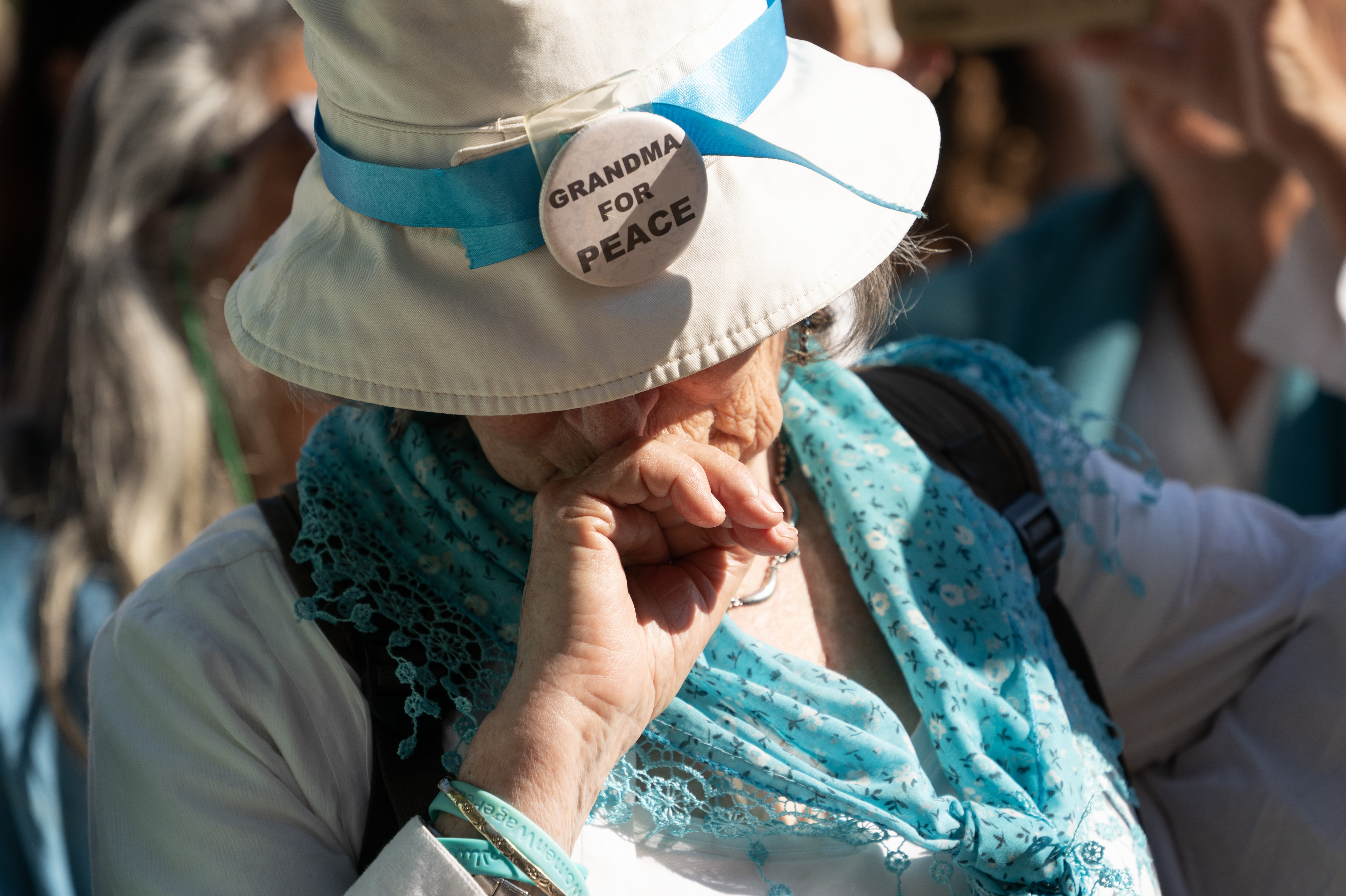 Mourners gather in Israel to honor memory of longtime peace activist Vivian Silver 6 A mourner reacts during Vivian's funeral service Thursday.