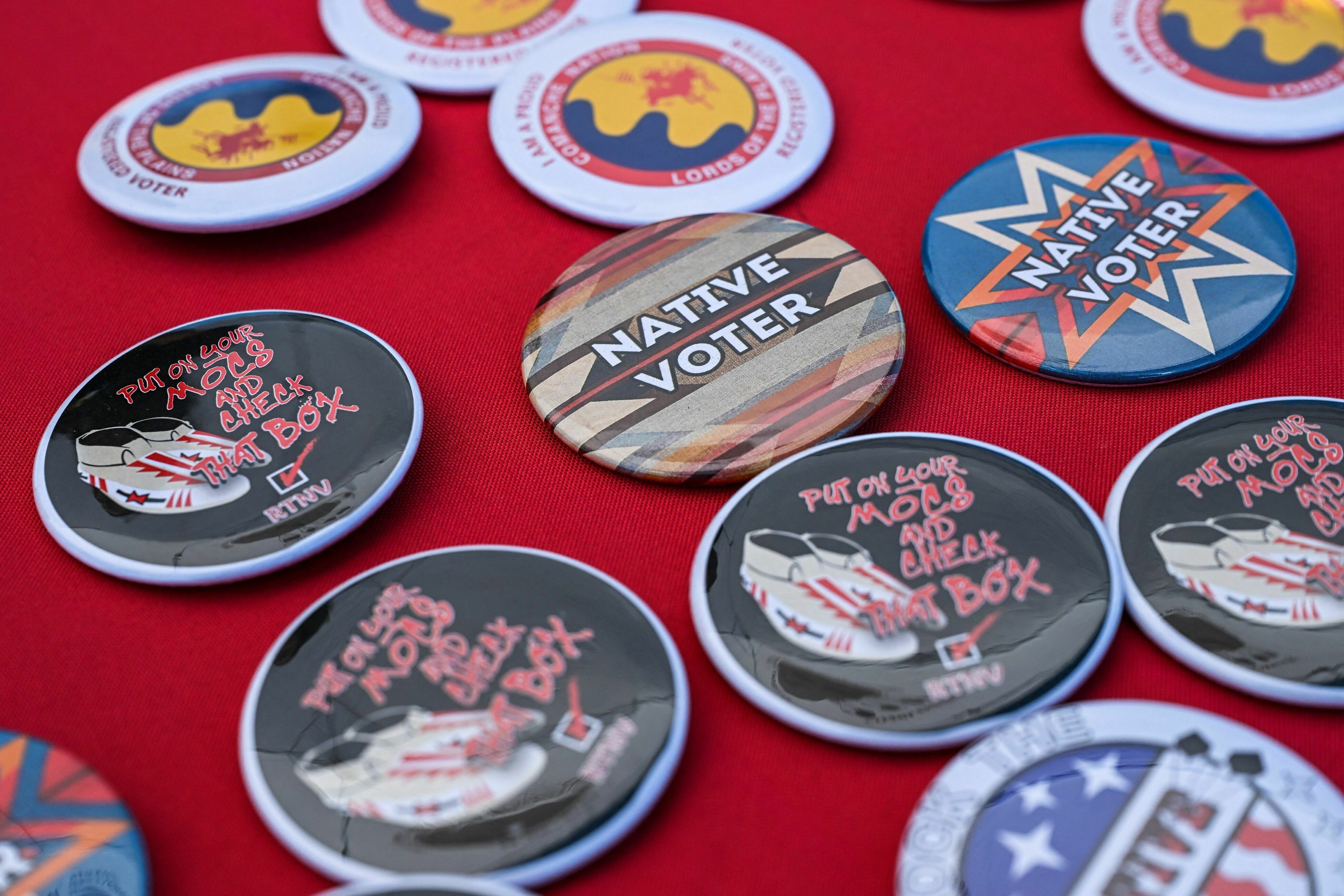 Pins are pictured at a display counter during a cultural meeting at the Comanche Nation fairgrounds in Lawton, Okla., on Sept. 30. (AFP via Getty Images)