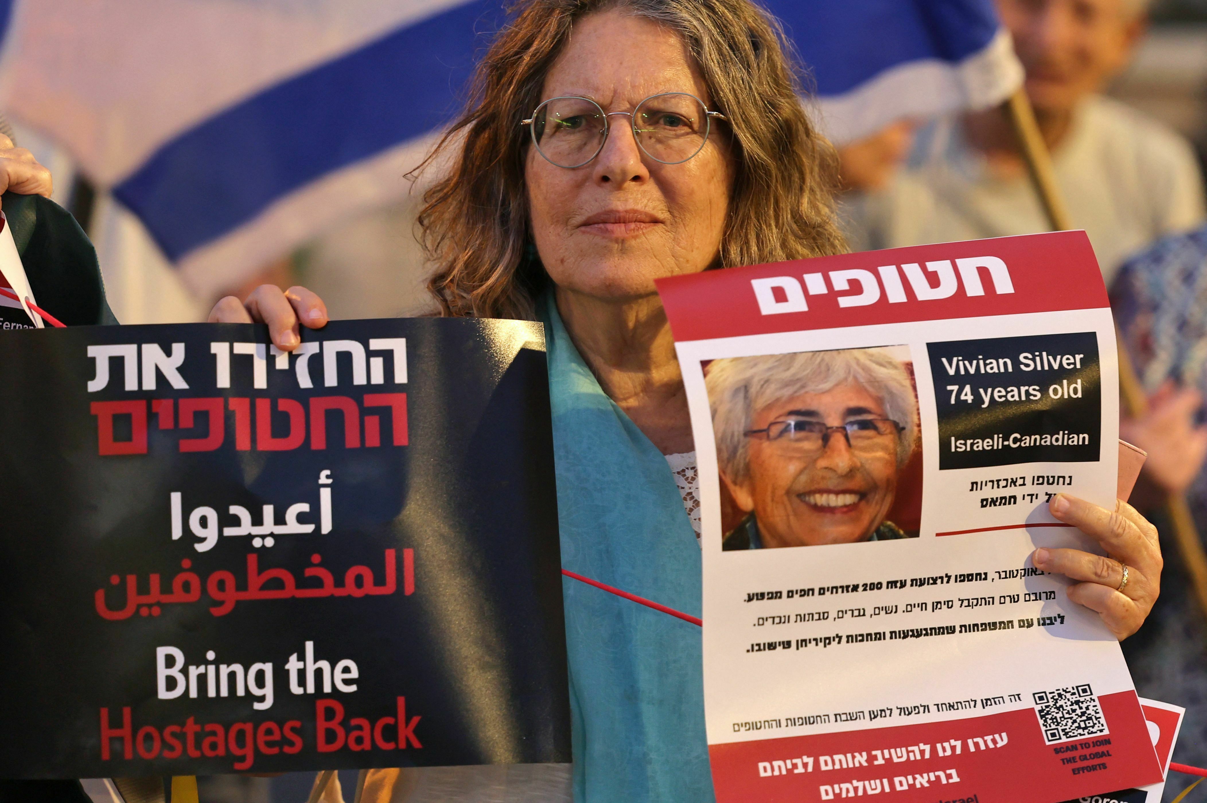 Mourners gather in Israel to honor memory of longtime peace activist Vivian Silver 2 A demonstrator holds a poster showing Israeli Canadian Vivian Silver, who was missing and was presumed to be held by Palestinian militants since Hamas' Oct. 7 attack, during a protest for her release outside the president's residence in Jerusalem on Oct. 29.