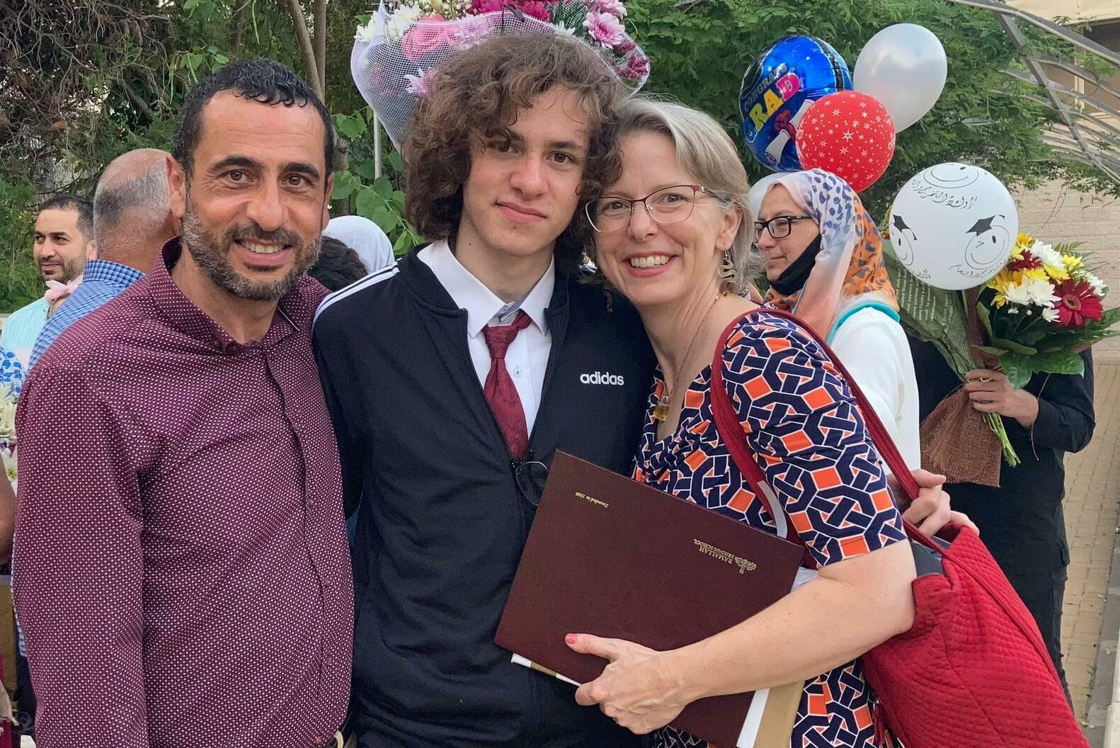 Hisham Awartani with his father, Ali Awartani, and mother, Elizabeth Price. On Saturday, Awartani was one of three men of Palestinian descent shot in Burlington, Vermont. (Elizabeth Price)