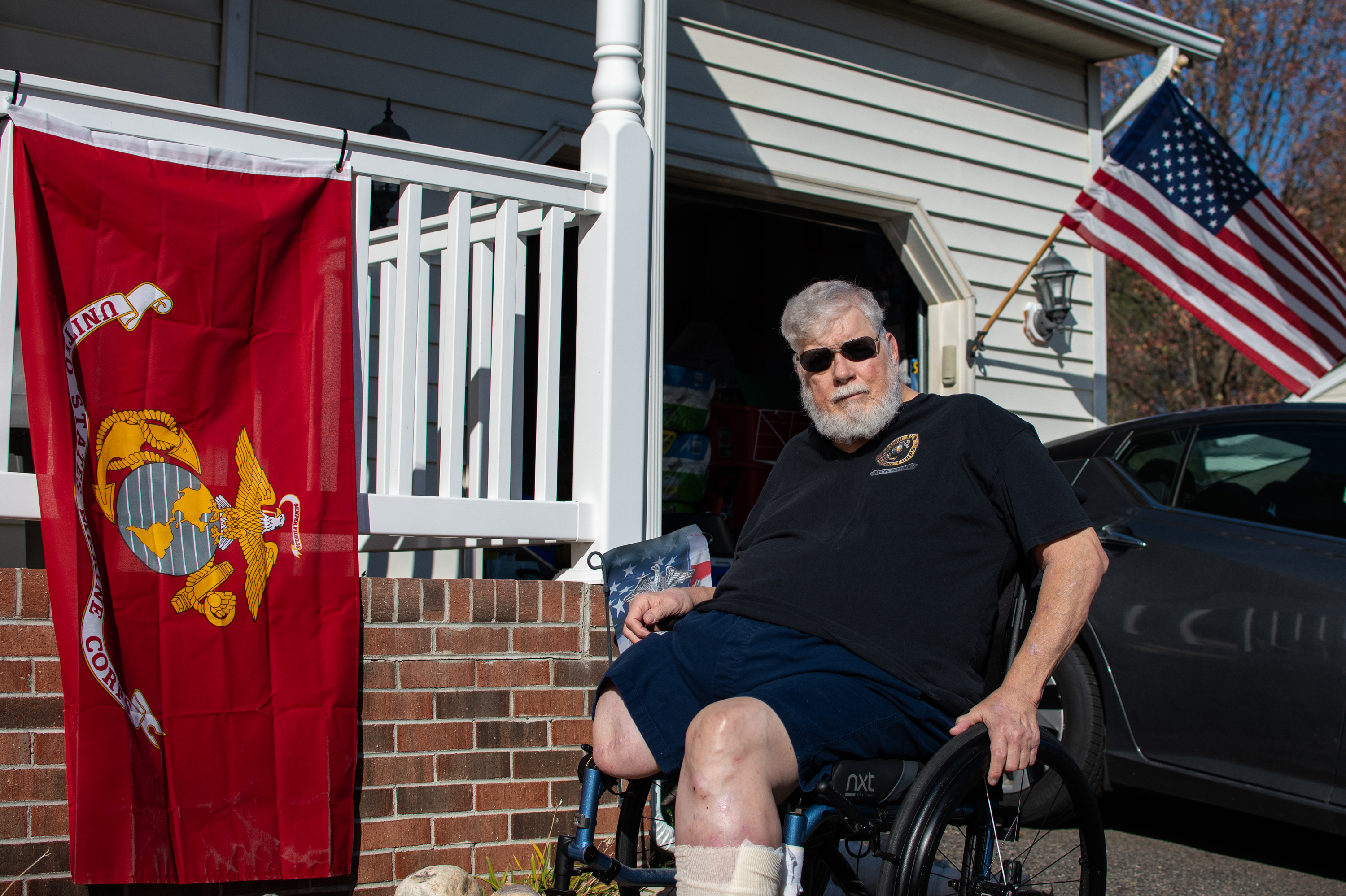 Marine Corps veteran Ed O'Connor is seen outside his home in Fredericksburg, Va. He is among tens of thousands of veterans who took a COVID forbearance on a VA home loan. But the VA's program ended abruptly in October of 2022 and many veterans were asked to either pay all the missed payments or face foreclosure. (NPR)