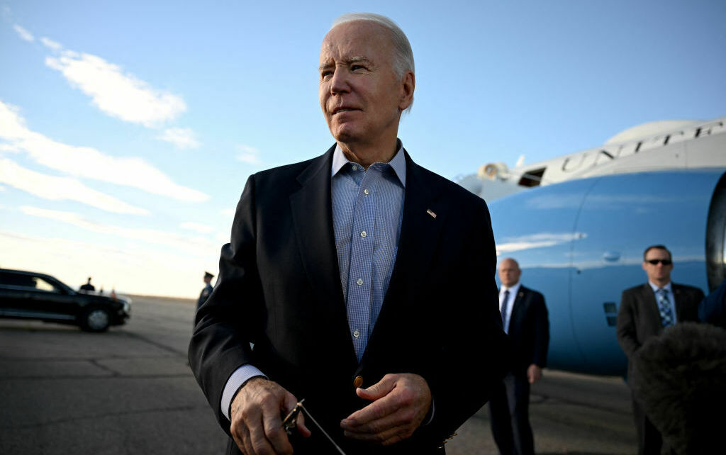 President Biden speaks to reporters before boarding Air Force One at Pueblo Memorial Airport in Pueblo, Colo., on Nov. 29. (AFP via Getty Images)