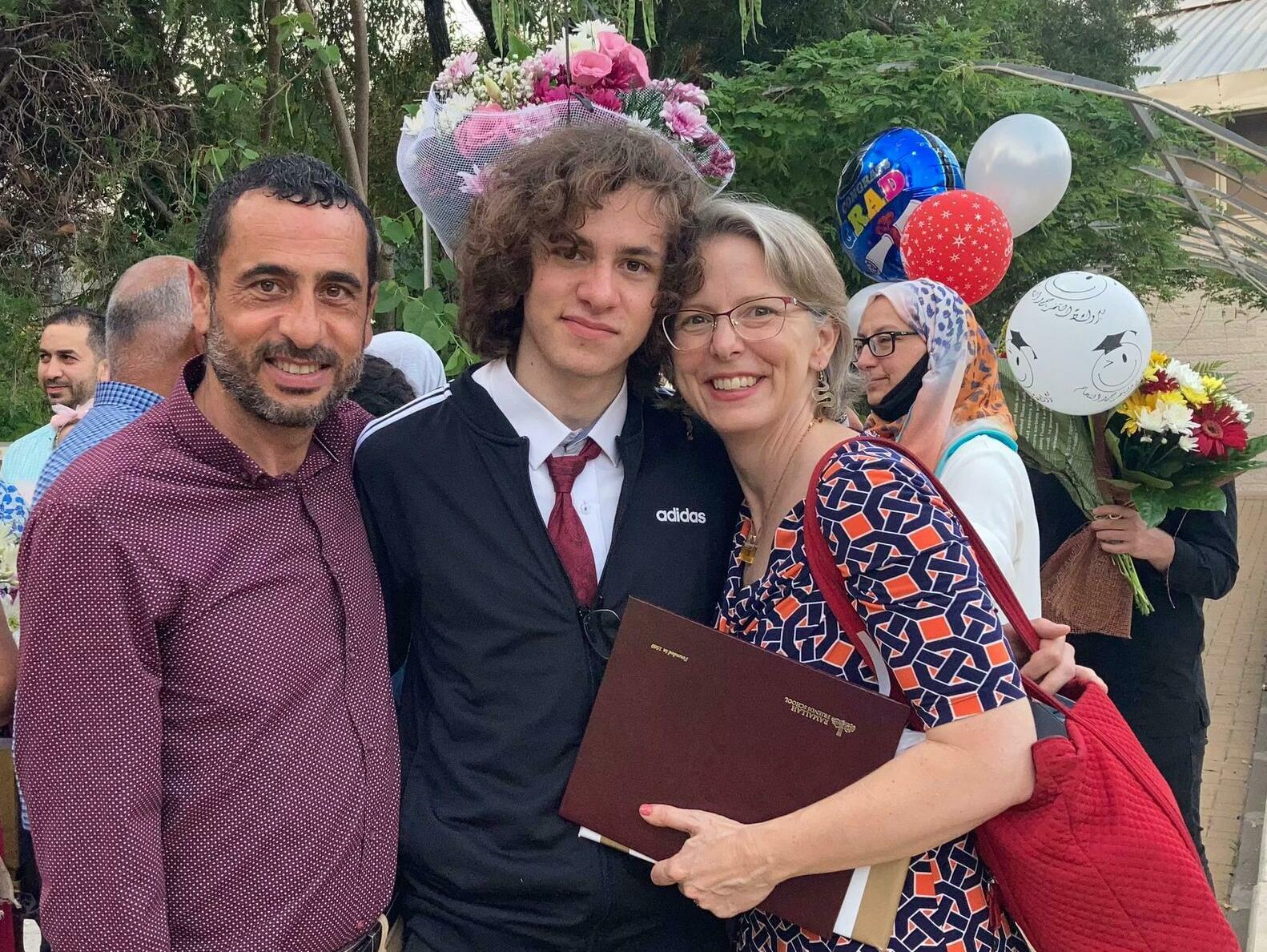 Hisham Awartani with his father, Ali Awartani, and mother, Elizabeth Price. Awartani is a junior at Brown University, studying mathematics and archaeology. (Elizabeth Price)
