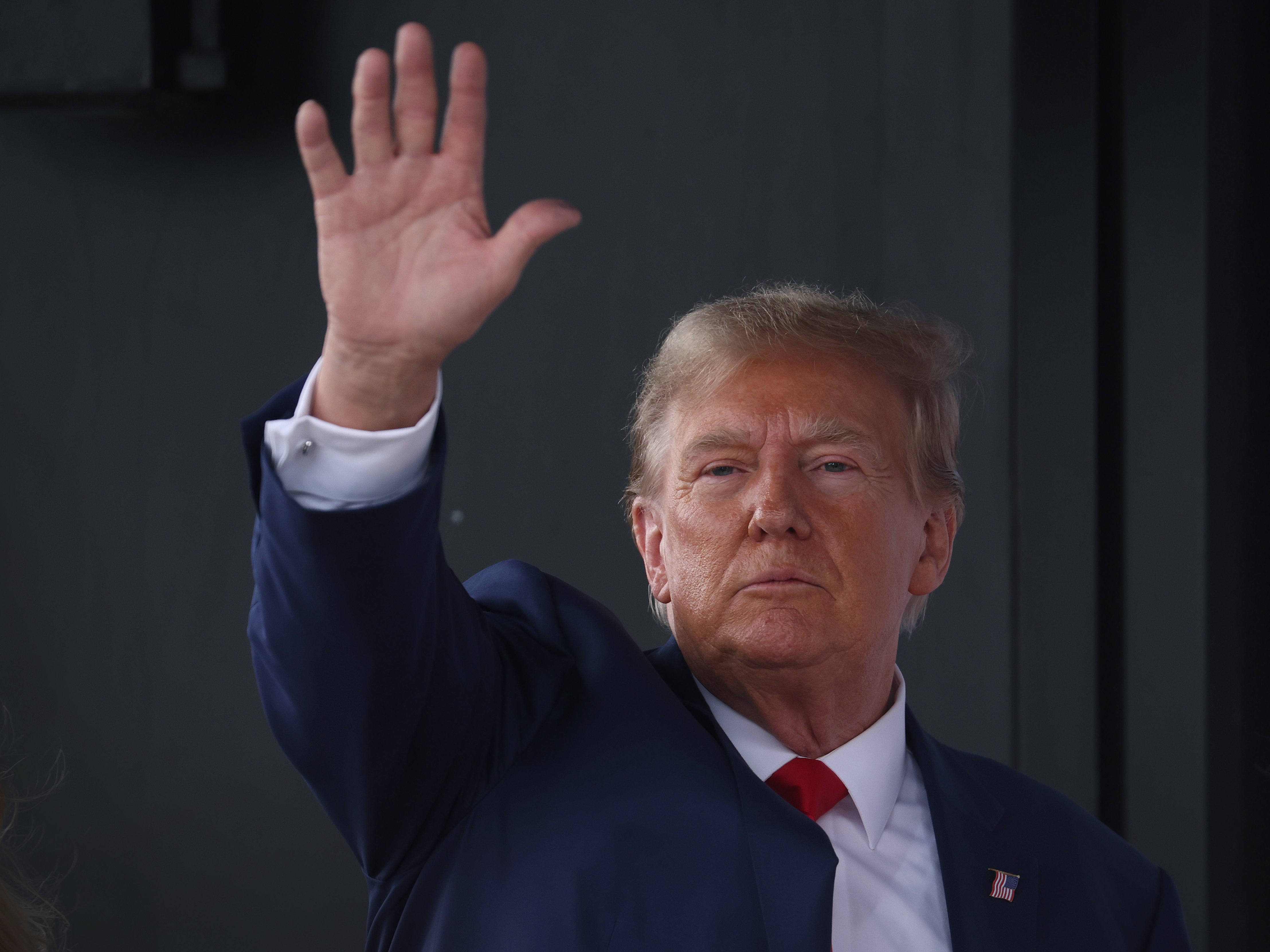 Republican presidential candidate former President Donald Trump leaves a commit to caucus campaign event at the Whiskey River bar on December 2, 2023 in Ankeny, Iowa. (Getty Images)