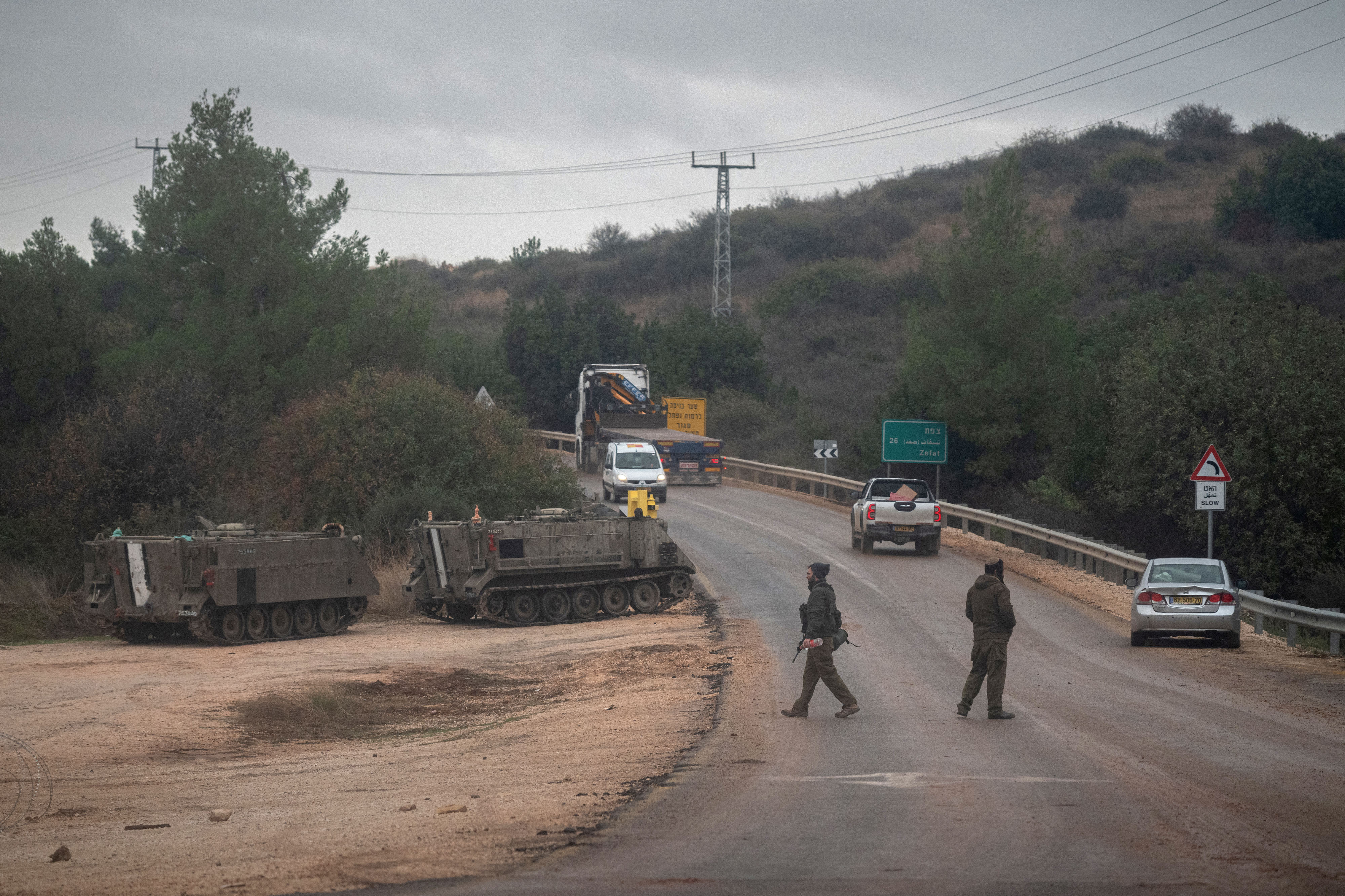 Israeli soldiers at a checkpoint near the border with Lebanon in northern Israel on November 28, 2023. (Tamir Kalifa for NPR)