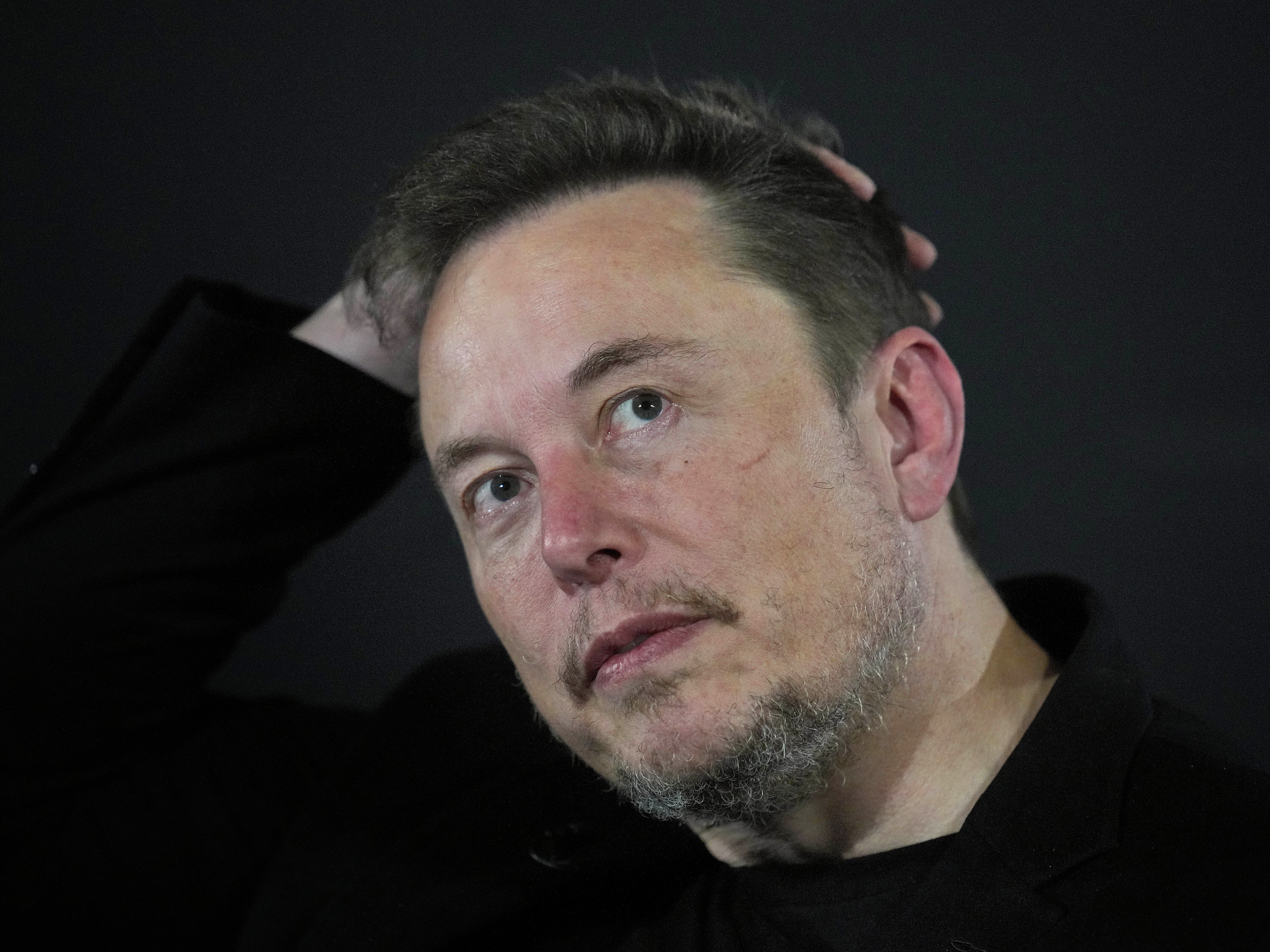 Elon Musk restores X account of Alex Jones : NPR