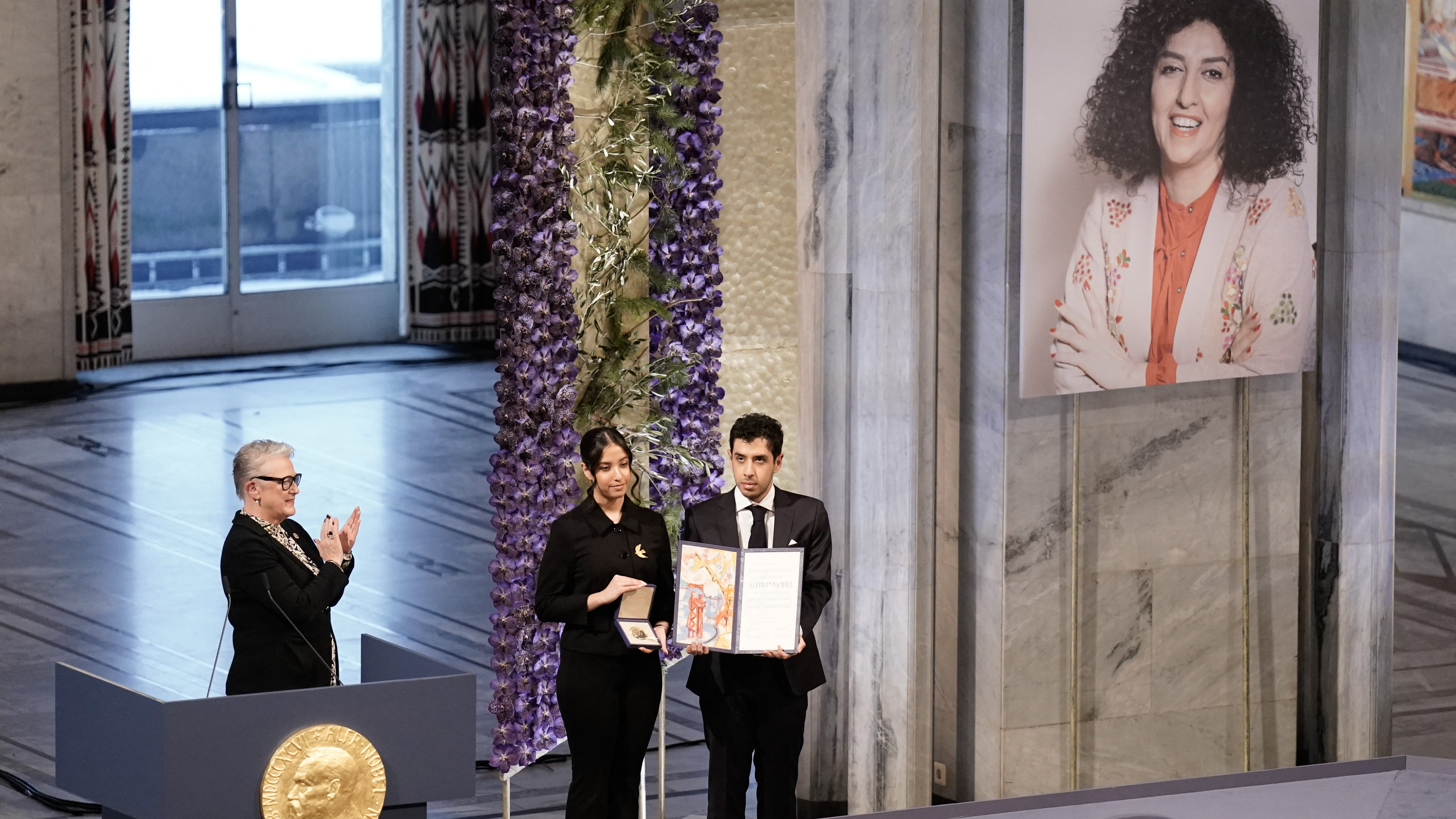 Children of jailed Iranian activist Narges Mohammadi accept her Nobel Peace Prize
