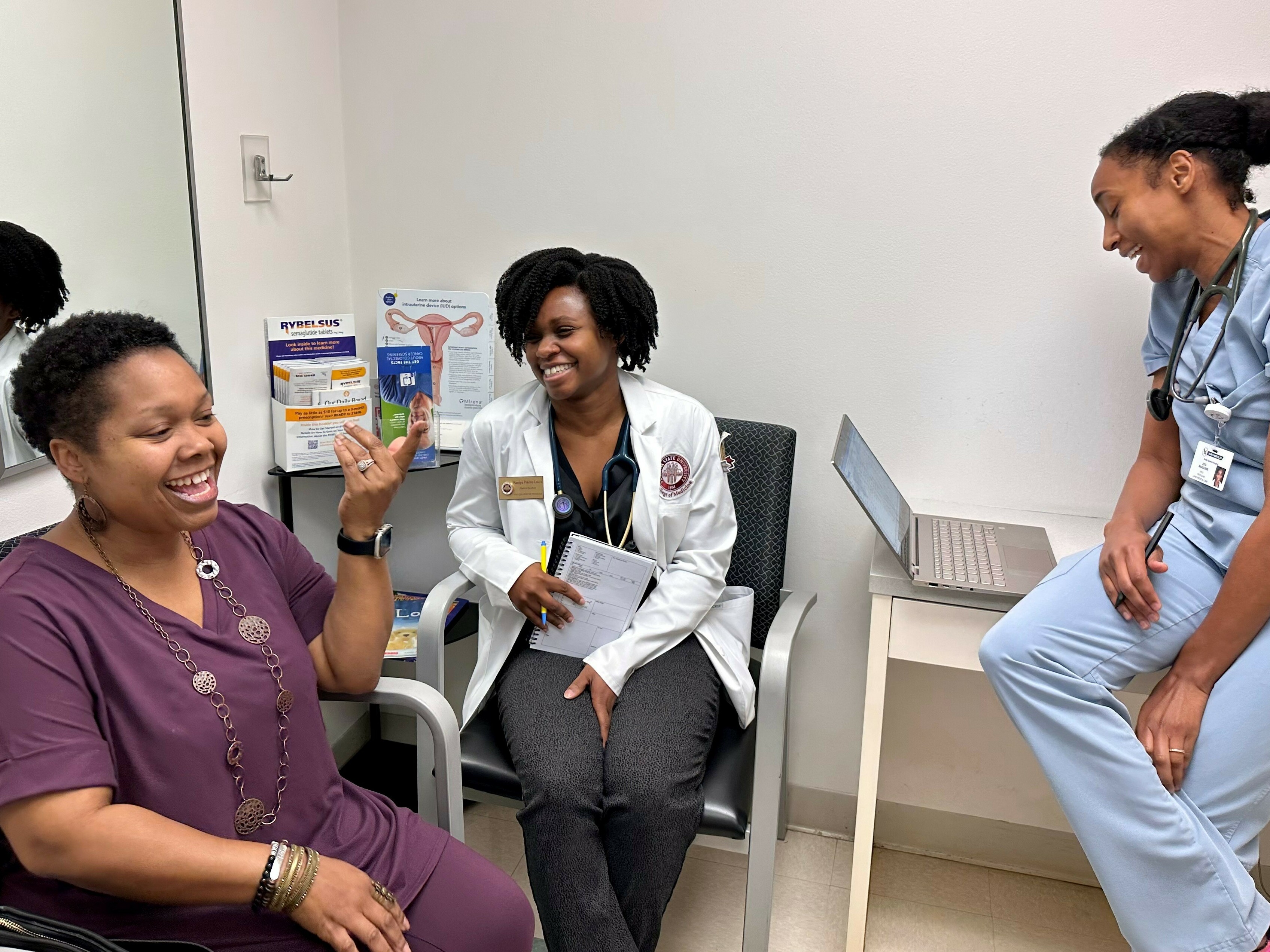 Can family doctors deliver rural America from its maternal health crisis? 3 YaSheka Shaw (left) celebrates losing weight during a checkup with medical student Kaniya Pierre Louis (center) and Dr. Zita Magloire.