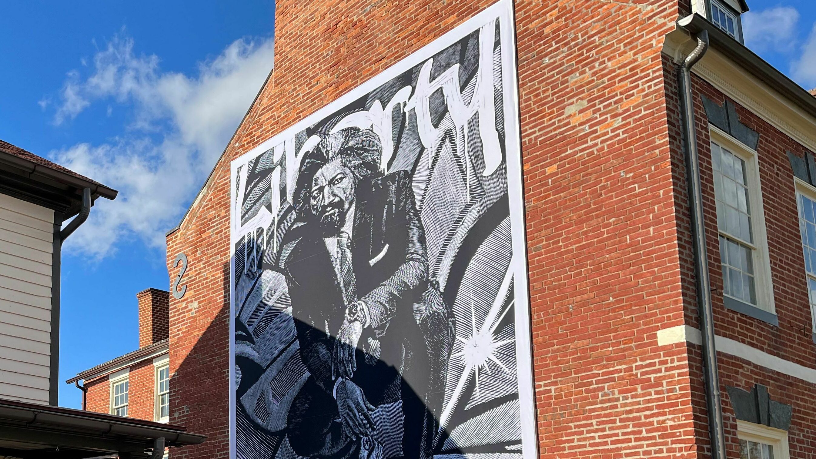 This Frederick Douglass mural in Easton, Md., is a modern-day makeover that has some in the abolitionist