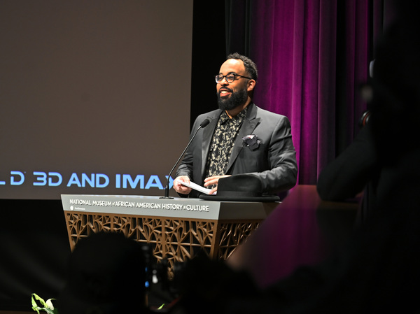 Kevin Young, director of the  National Museum of African American History and Culture, speaks at a screening of Black Panther:Wakanda Forever at the museum on Oct. 30, 2022.